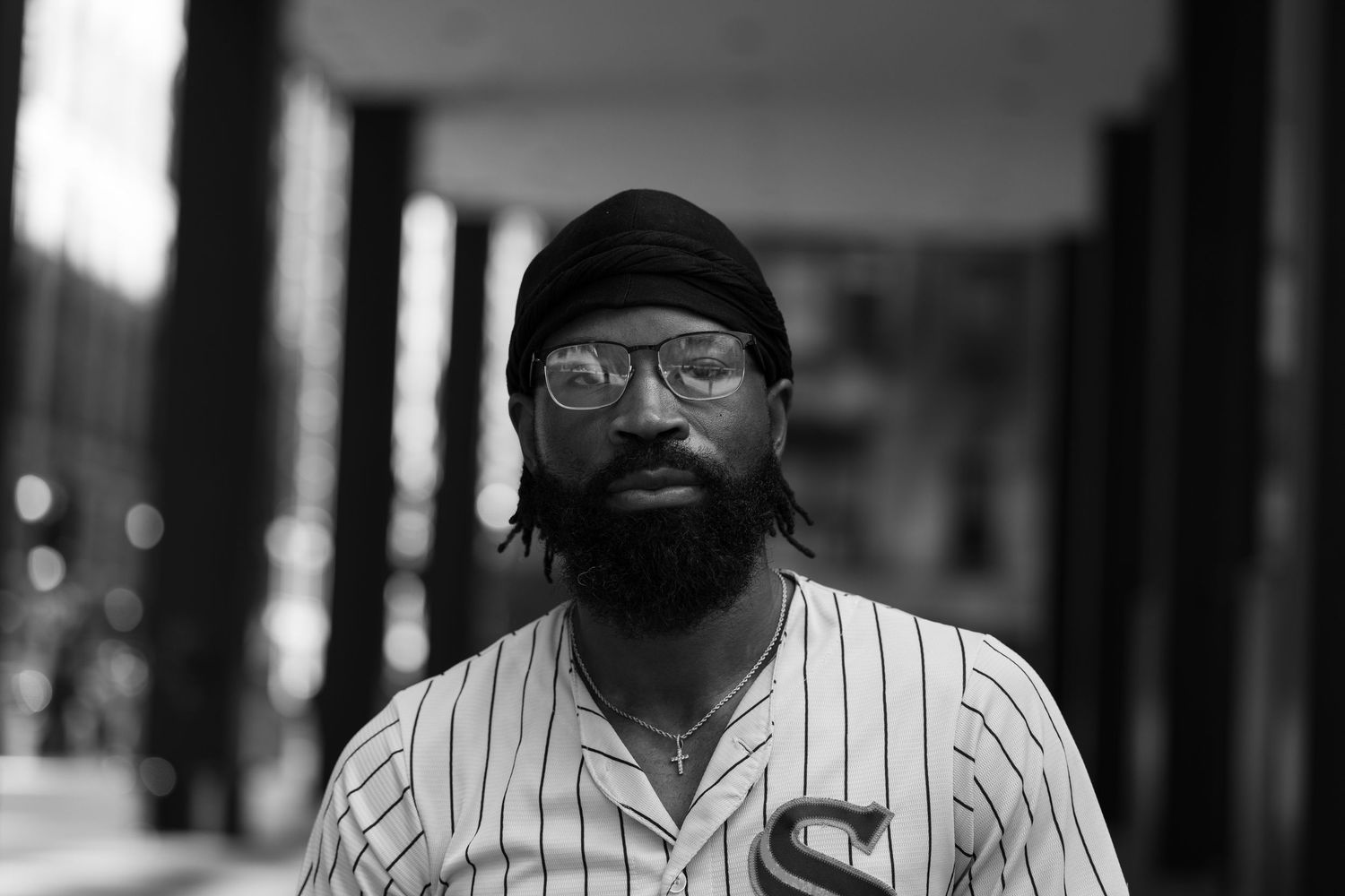 Self-Portrait in White Sox jersey. Monochrome Portrait.