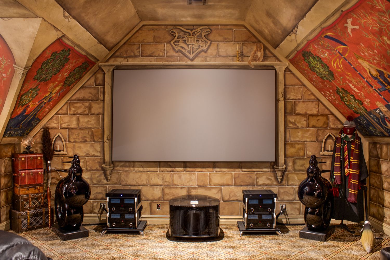 Ornate stone barrel ceiling with decorative lighting fixtures and architectural details.