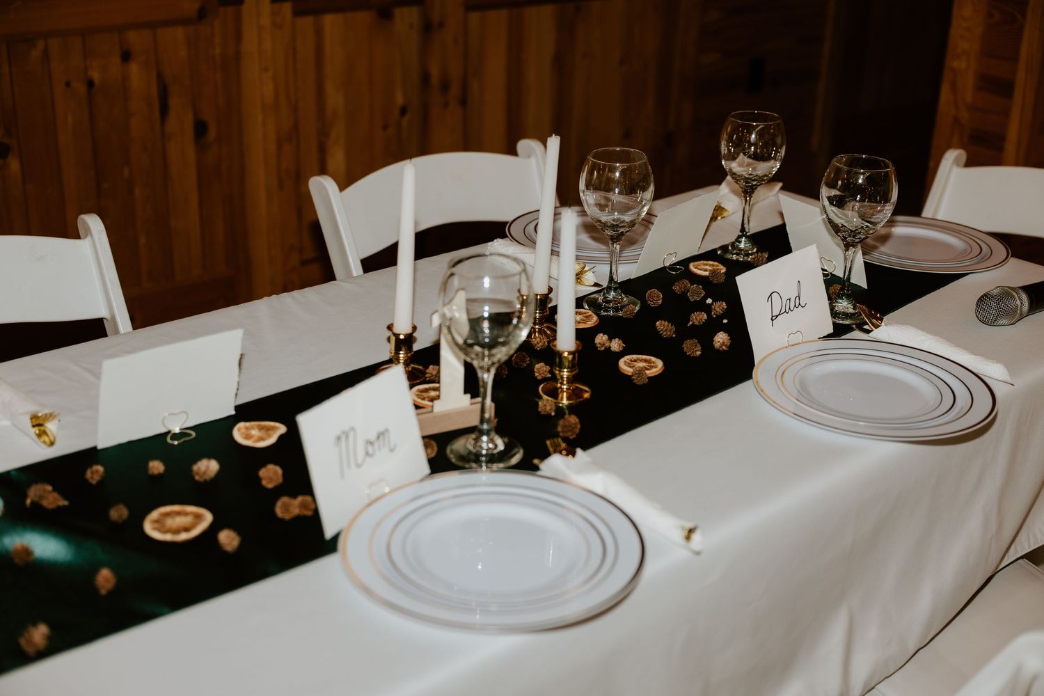 Elegant white tablecloth dining setup with wine glasses and place settings at an upscale restaurant.