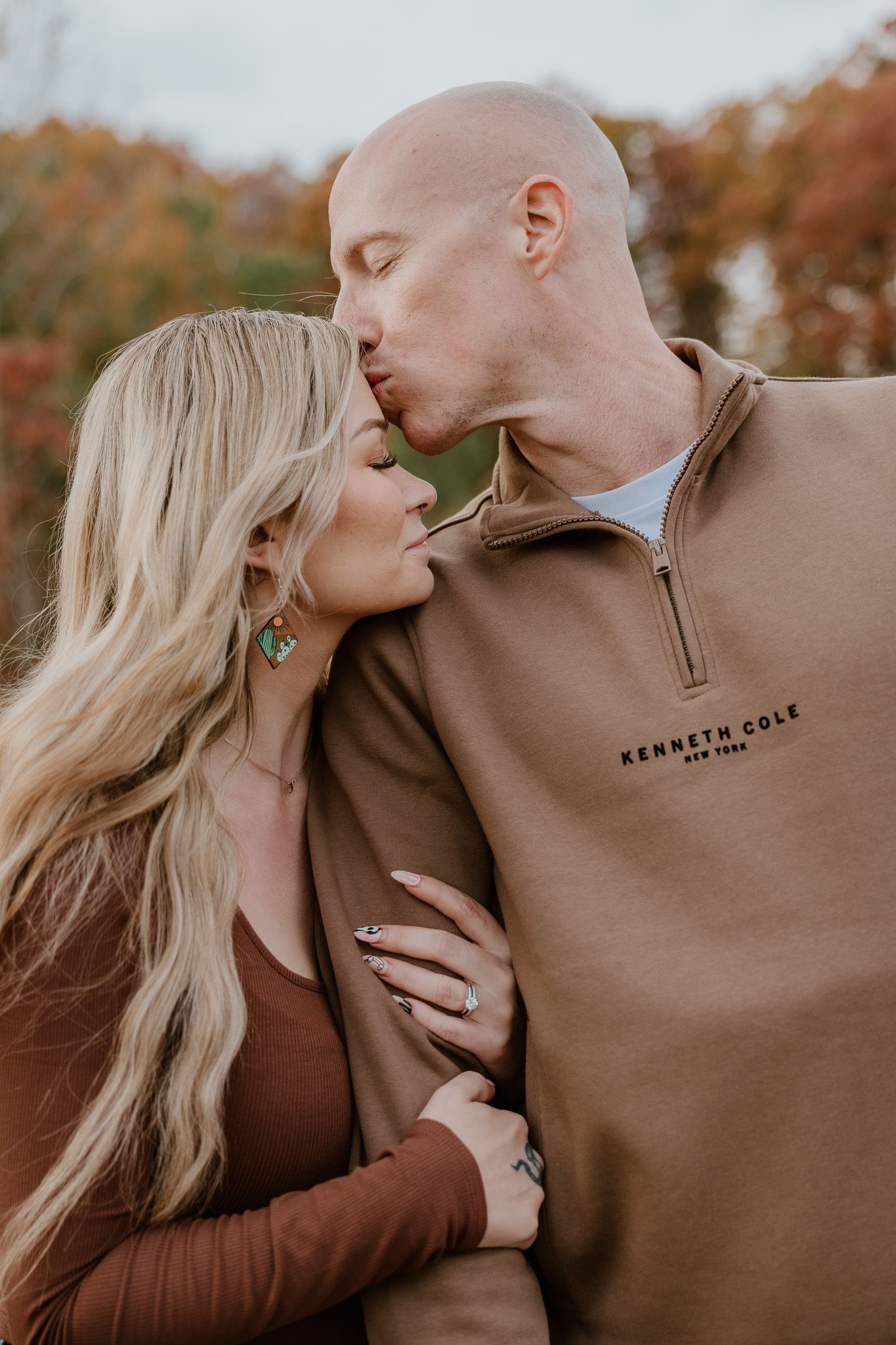 A romantic series of close-up shots showing a couple sharing intimate moments against an autumn backdrop.