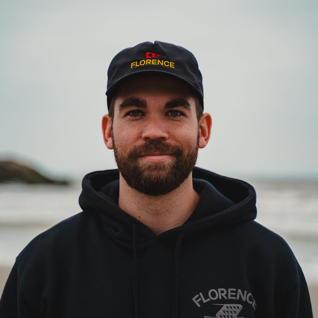 Series of close-up shots showing person in black hoodie and baseball cap against overcast background.
