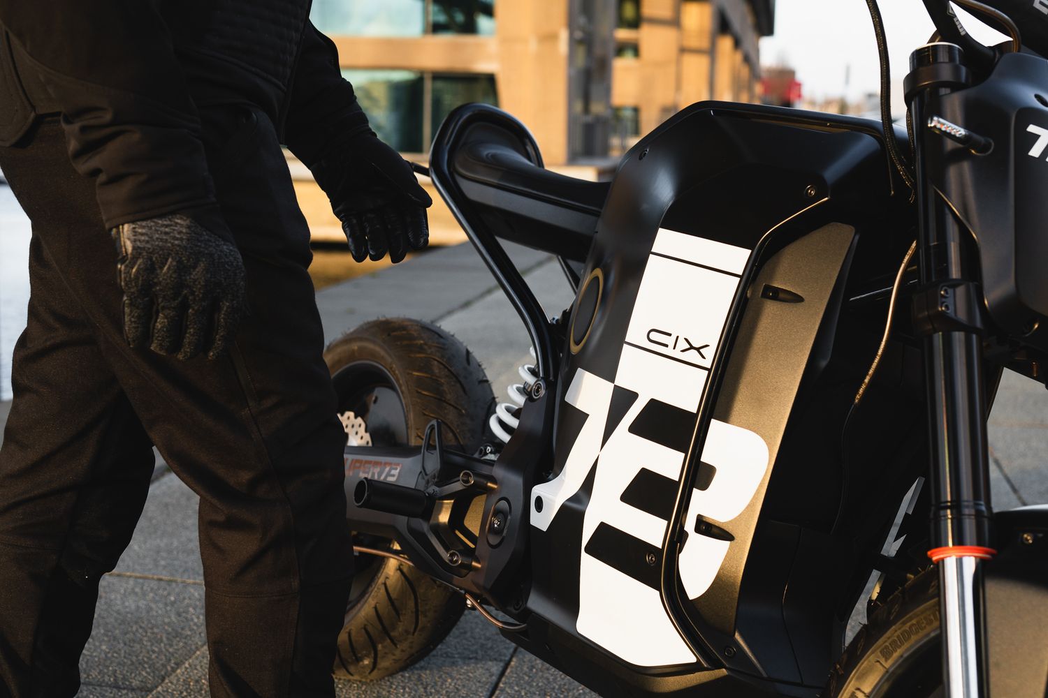 Close-up details of a custom motorcycle's mechanical components and chrome parts.