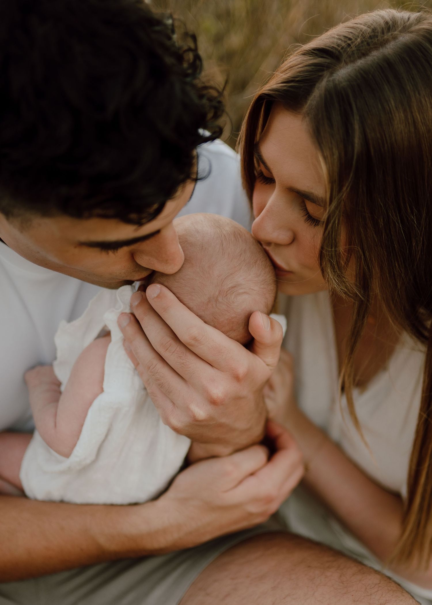 An intimate family moment captured during a professional photoshoot.