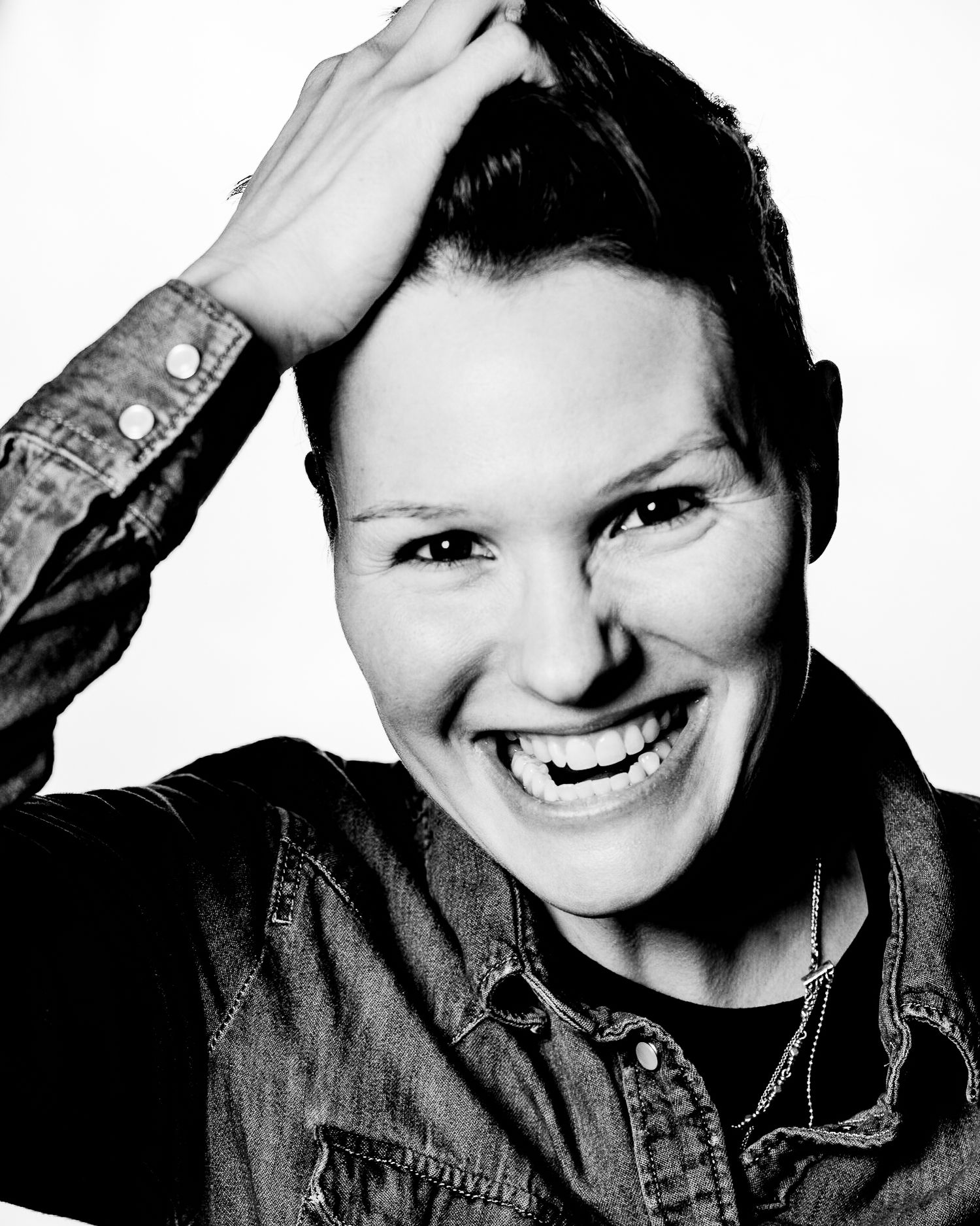 High contrast black and white headshots showing expressive emotions and movement.