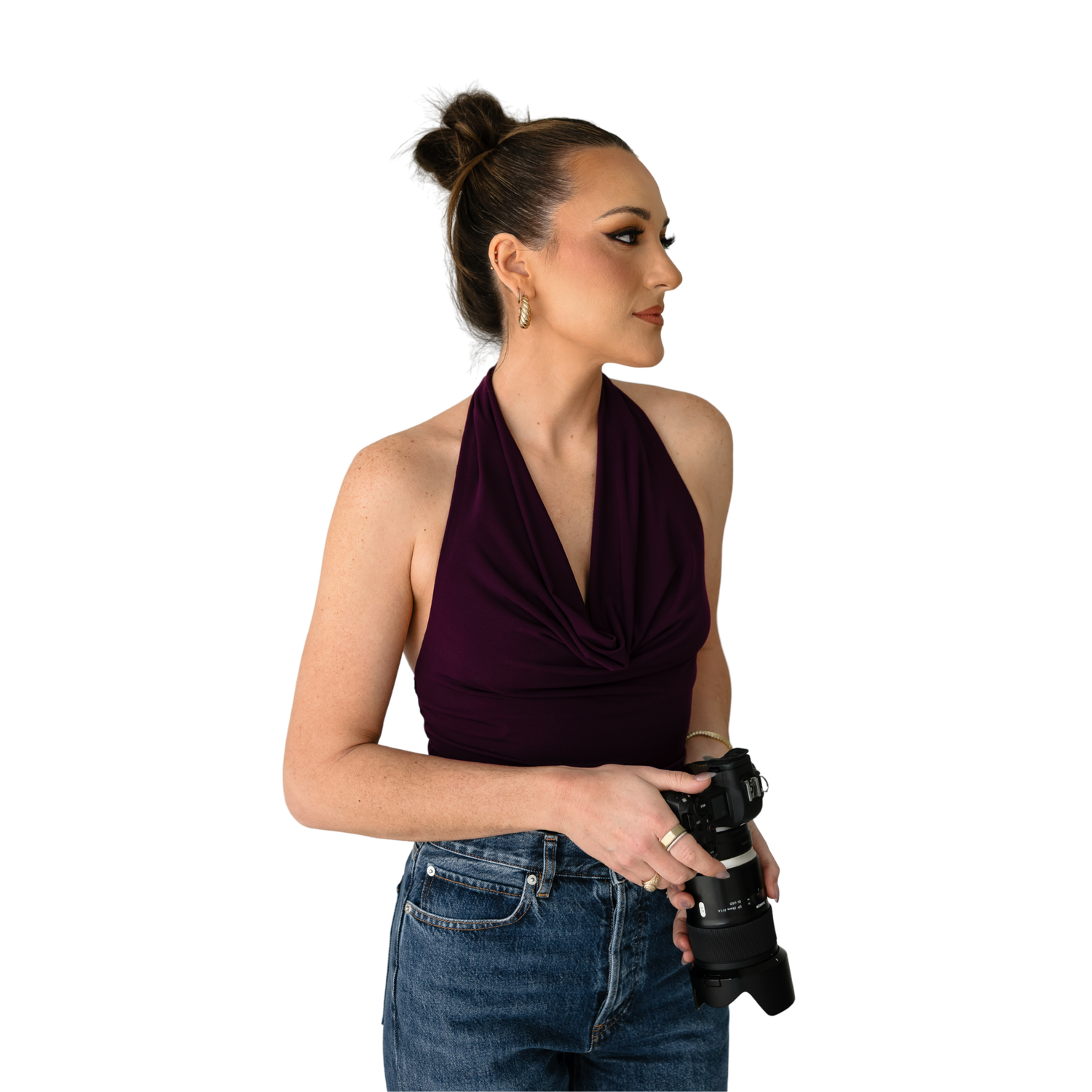 Person in dark sleeveless top and blue jeans poses in four different positions against white background.
