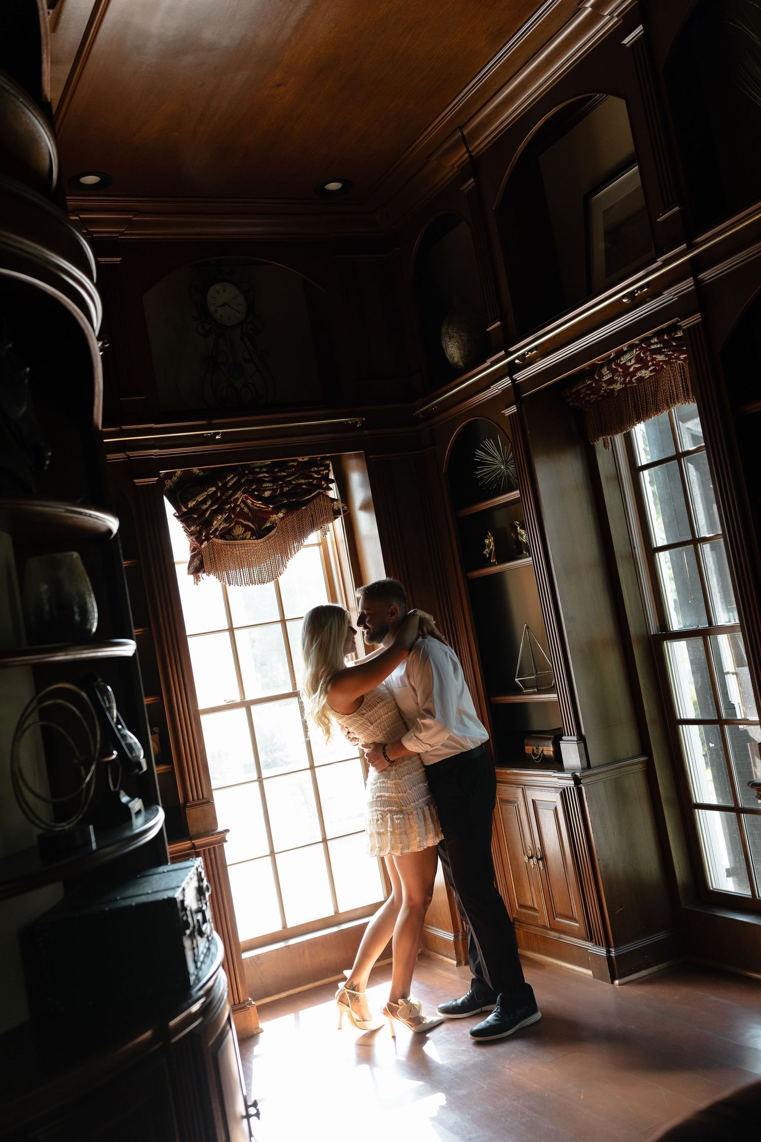 A series of photos showing a person in a white dress moving through sunlit rooms in an old house interior.