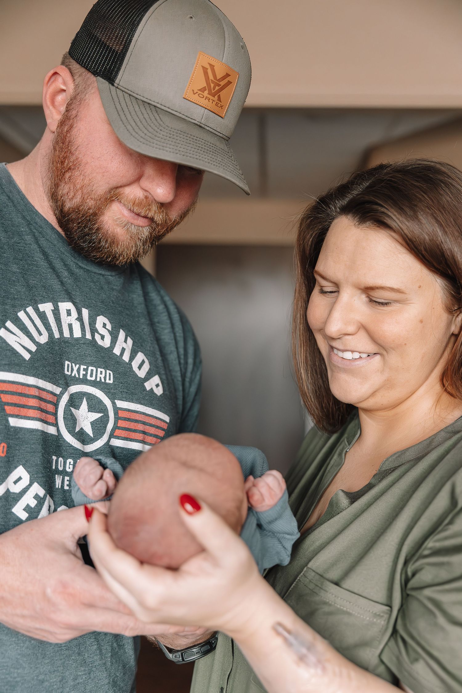 A couple shares tender moments with their newborn baby in a series of candid photos showing love and bonding.