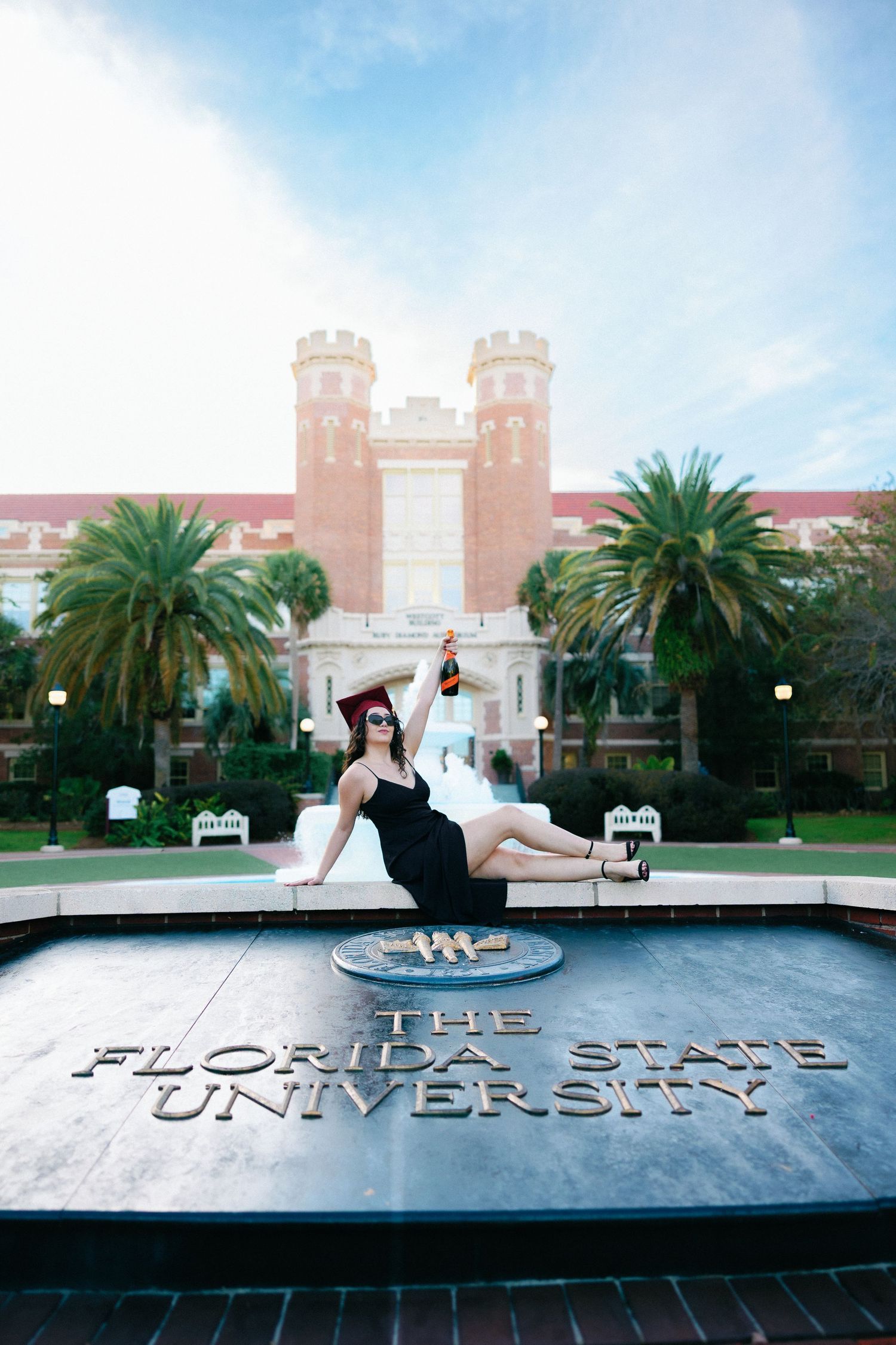 Wedding photos captured at Florida State University's iconic campus with palm trees and historic architecture.