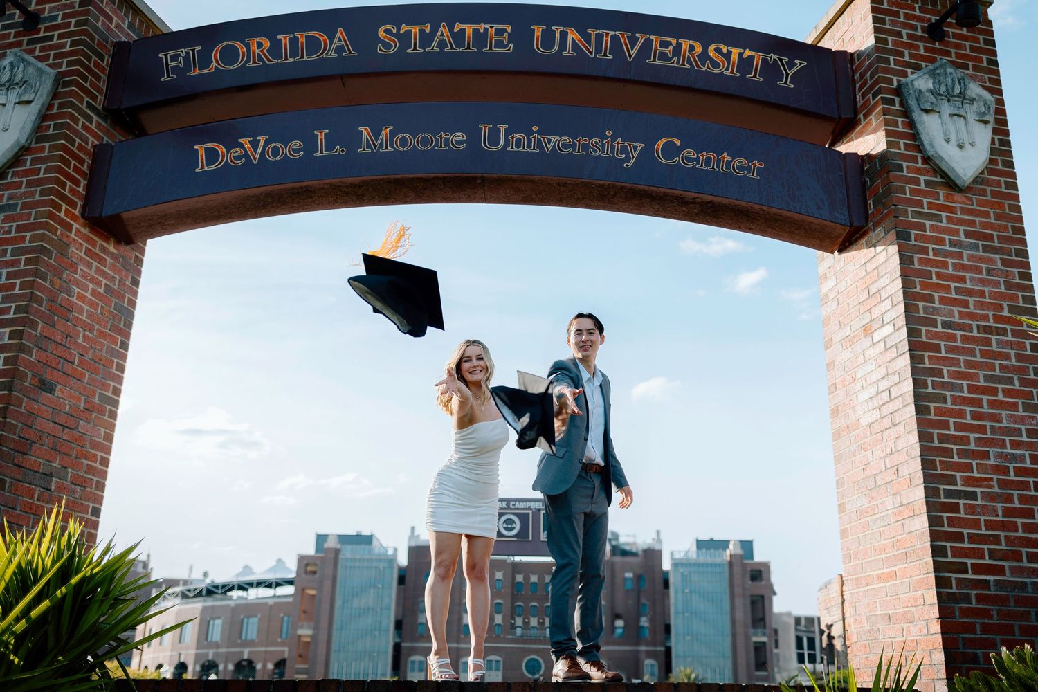 Florida State University Center entrance sign against blue sky.