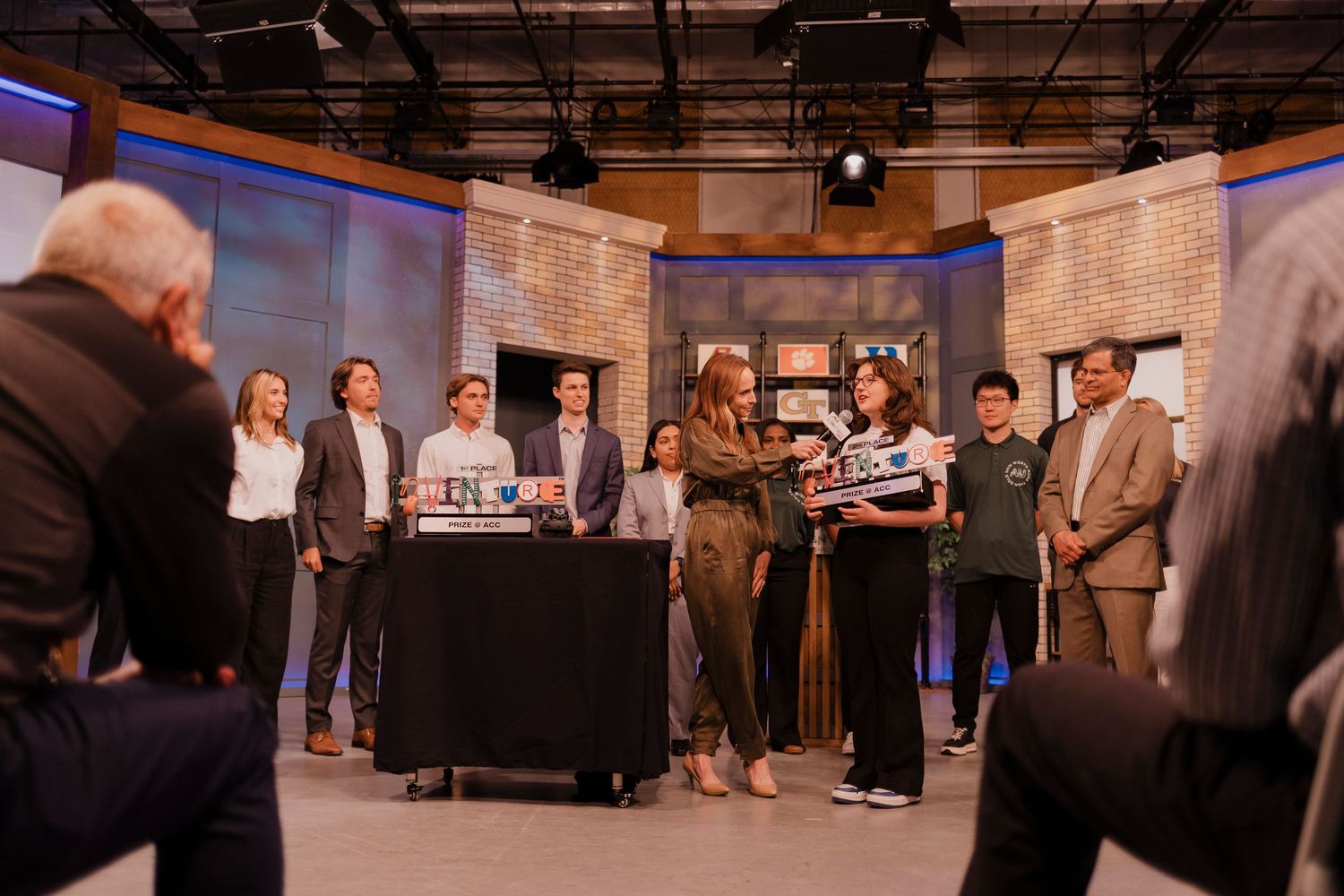Interior shots show various angles of guests and staff interacting in what appears to be a television studio setting.