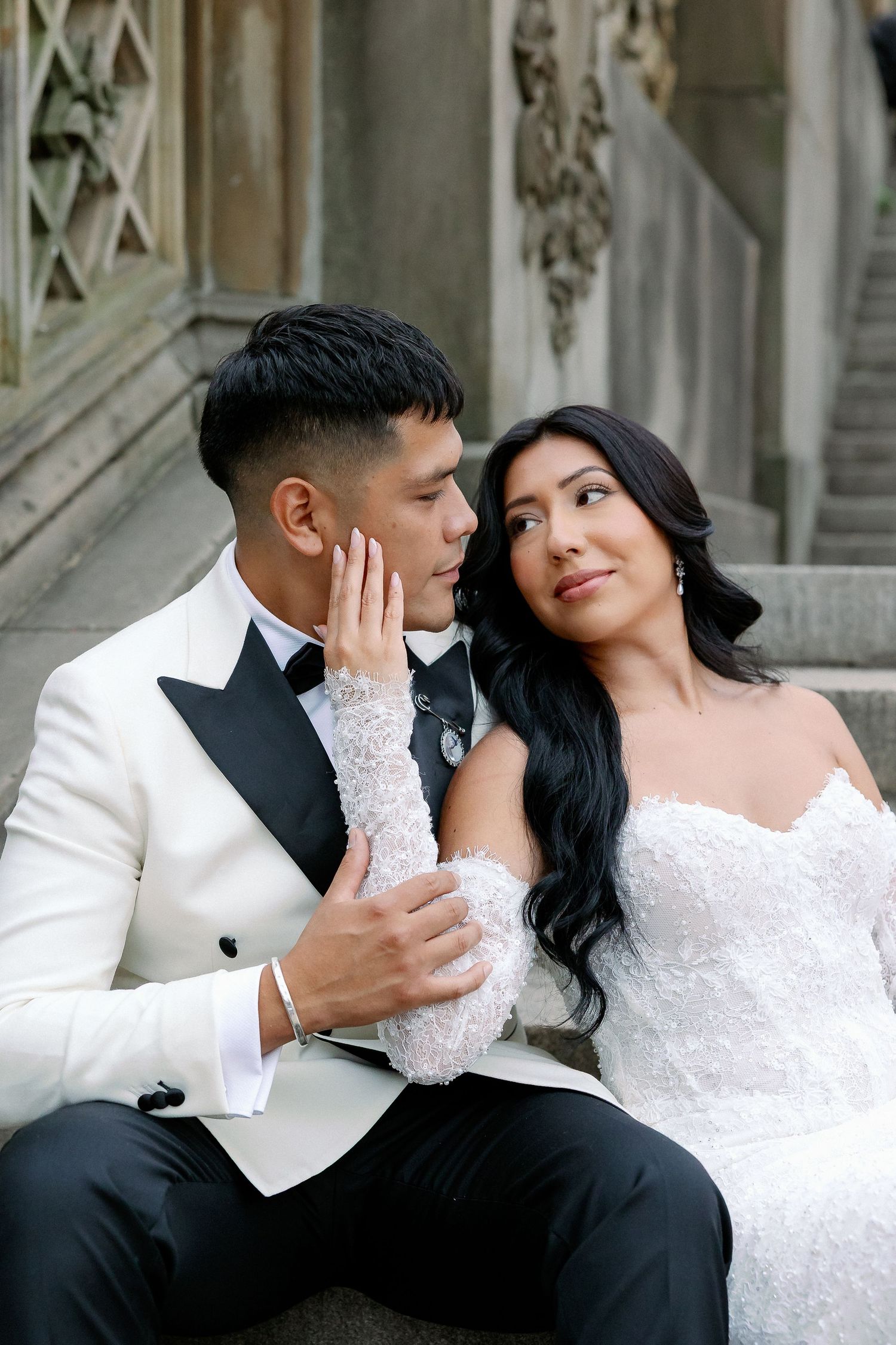 A romantic wedding photo series showing tender moments between a couple in formal attire against an elegant backdrop.