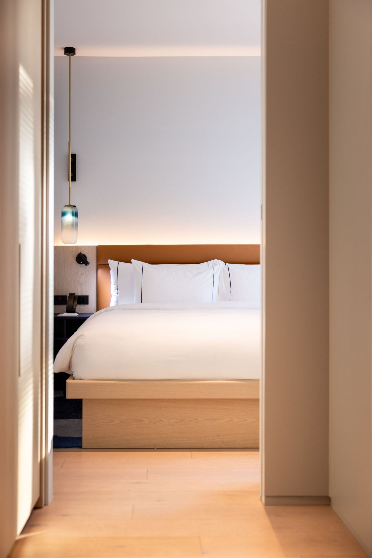 Doorway view into a bedroom at Lanson Place Parliament Gardens