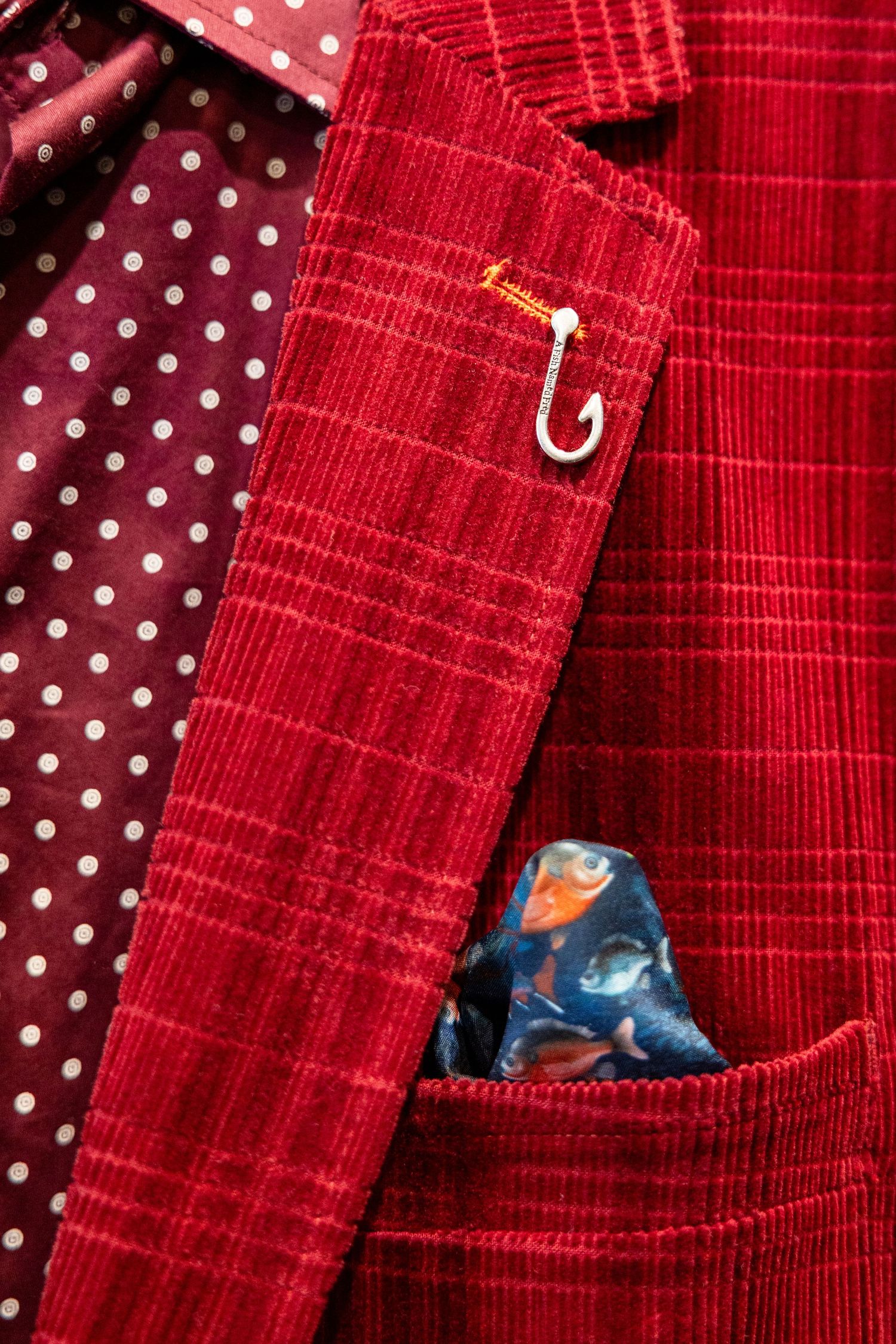 Red check jacket with a pocket square at Mitchell McCabe menswear, South Melbourne