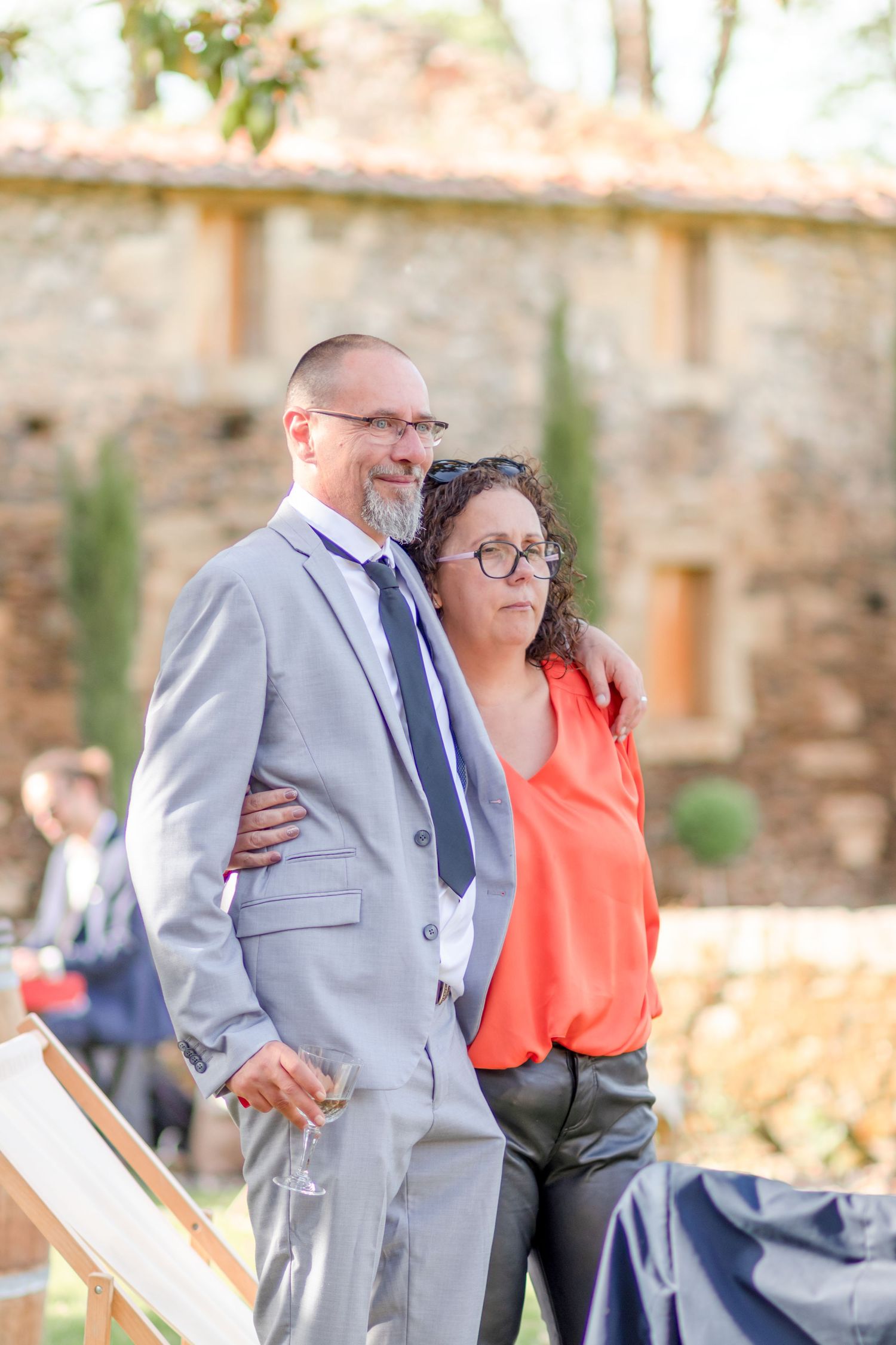 Couple enjoying a moment together at an outdoor event venue.