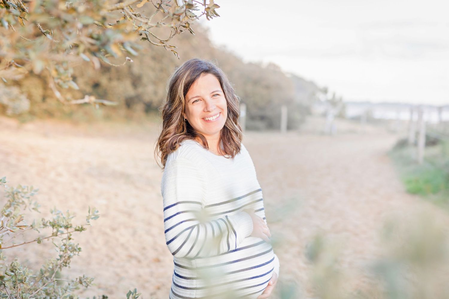 Portrait sequence in warm autumn tones featuring someone in a striped nautical sweater.