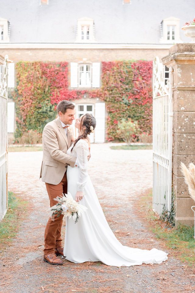 Sequence of romantic wedding poses against stone columns and flowering vines.