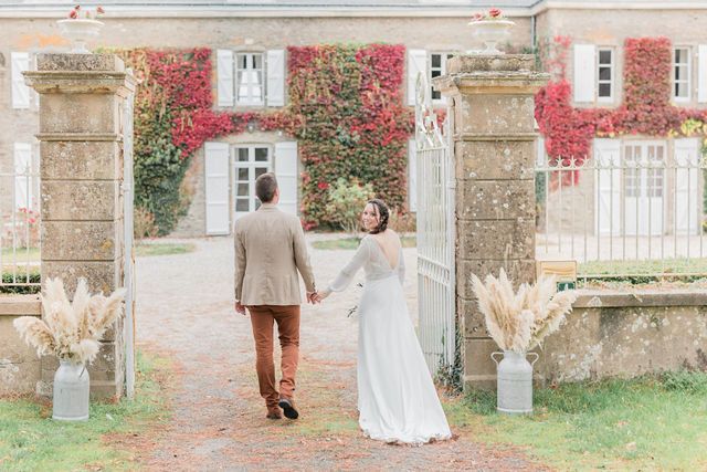 Wedding photography sequence on stone path with rustic mansion backdrop.