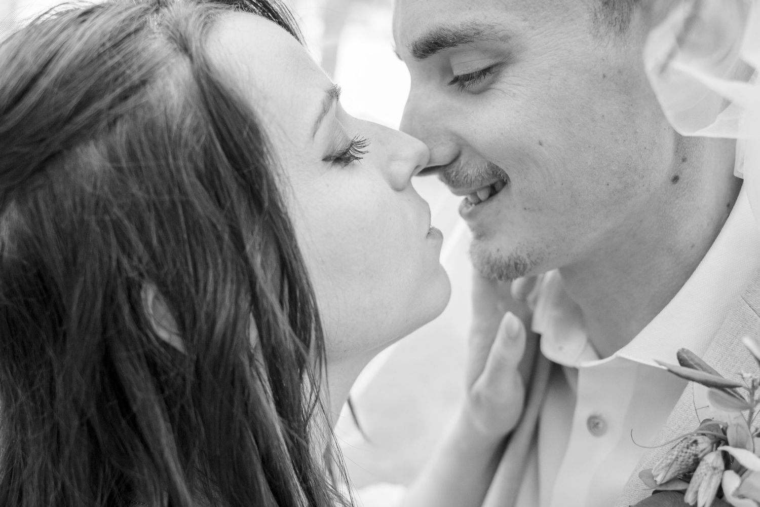 Black and white romantic close-up portraits showcasing tender moments.