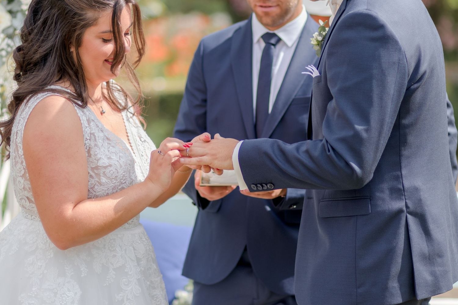 Wedding couple shares intimate moments during outdoor photo session.