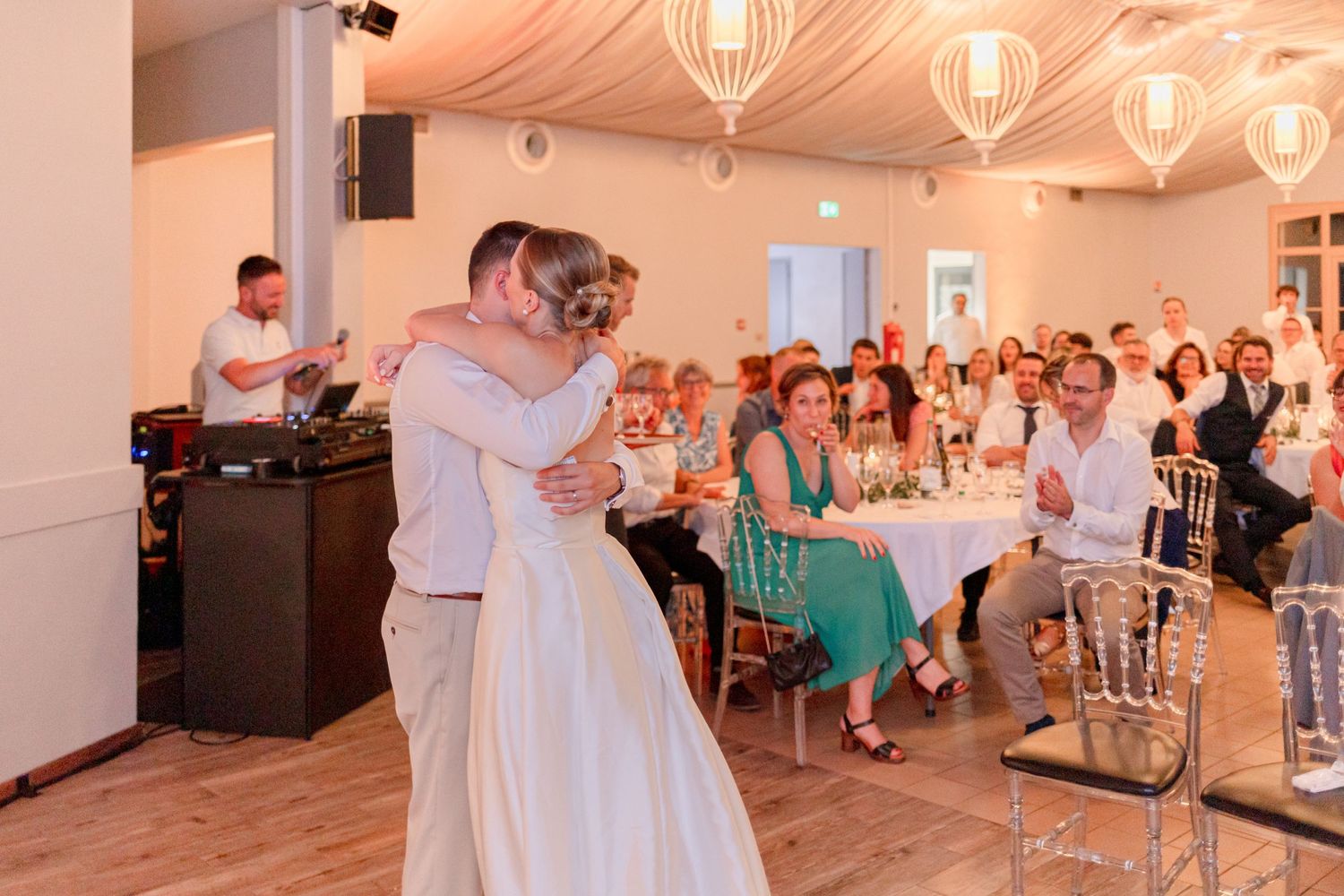 Wedding reception dance floor filled with guests enjoying the celebration.