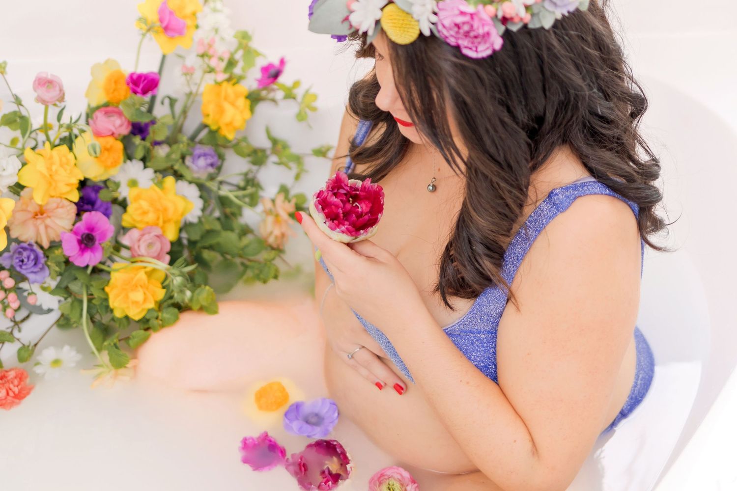Delicate pink and yellow flowers surround a blue lingerie boudoir scene.