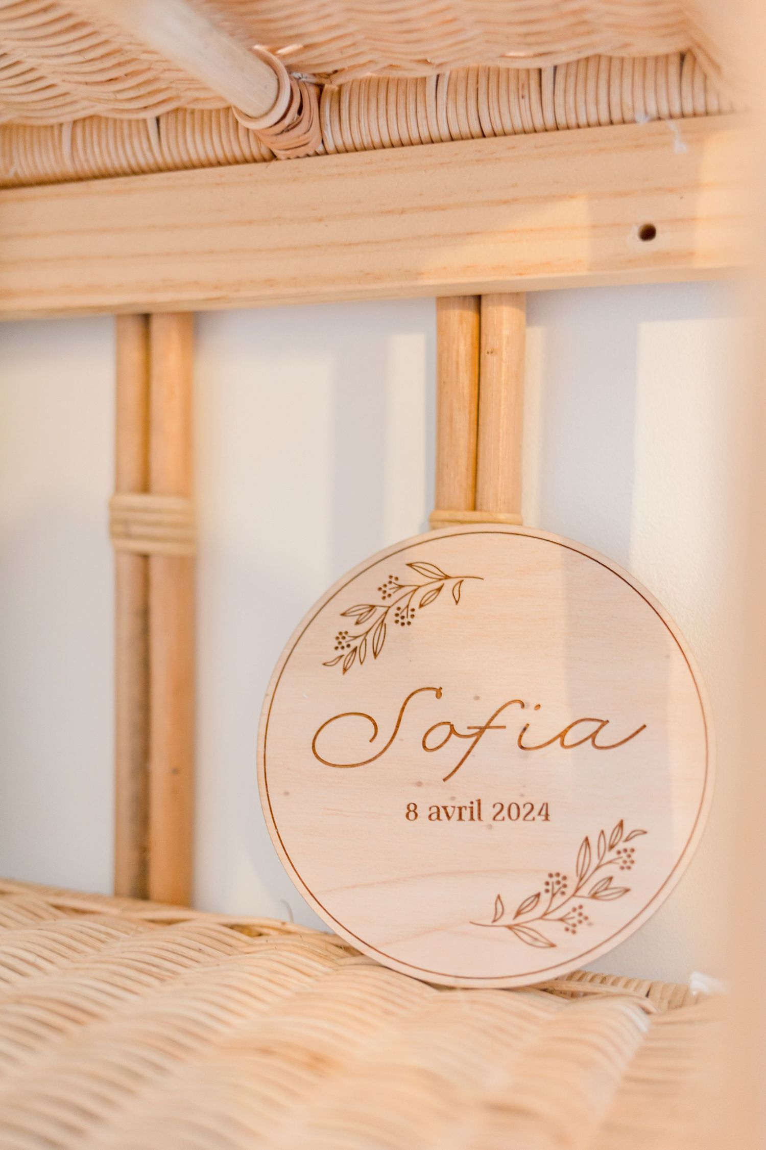 Wooden circular plaque engraved with 