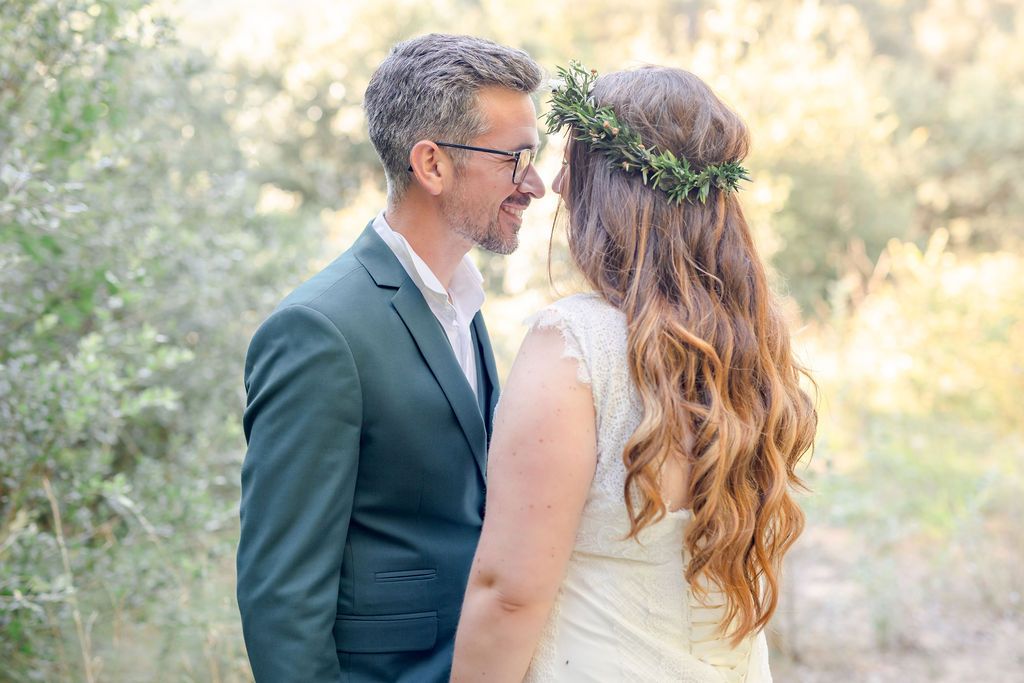 Golden hour wedding portraits in a natural outdoor setting.