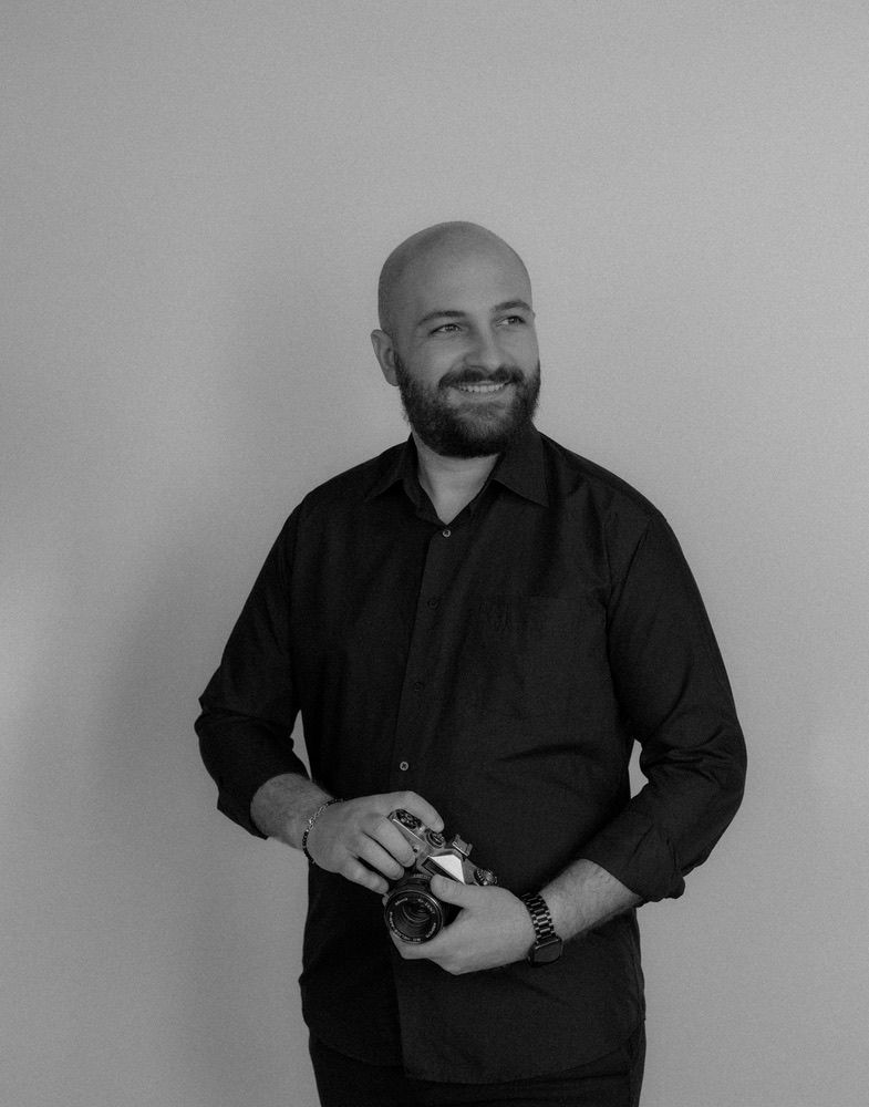 Black and white portrait series showing casual poses against neutral background.