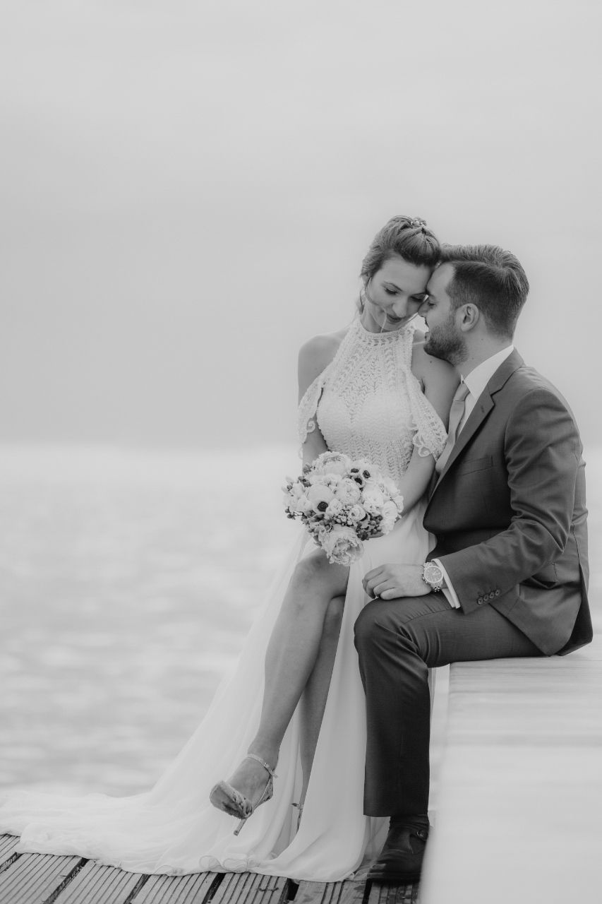 Romantic black and white wedding portraits showing tender moments between newlyweds.