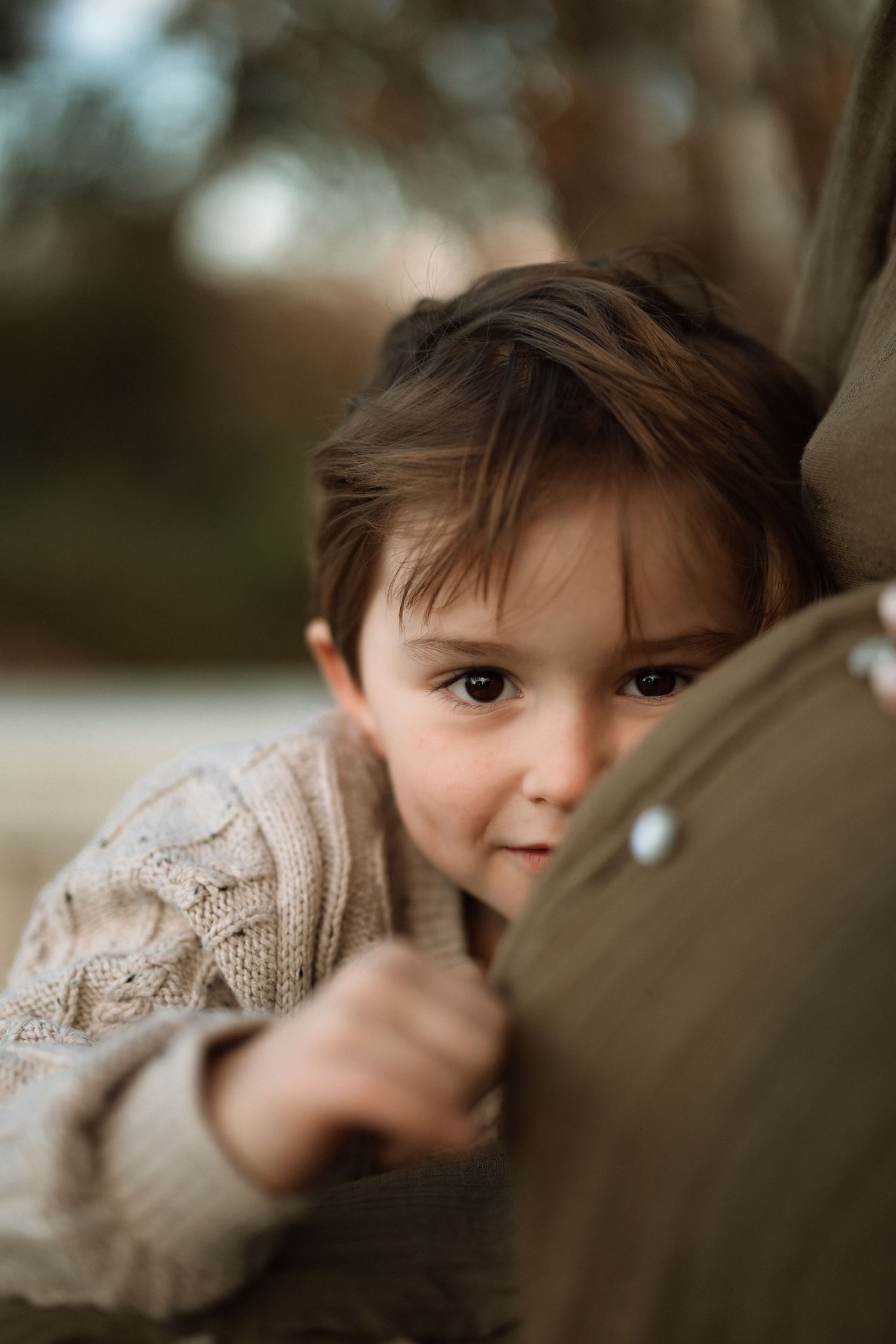 A series of close-up photos showing a gentle gaze from behind natural elements, creating a dreamy and artistic mood.