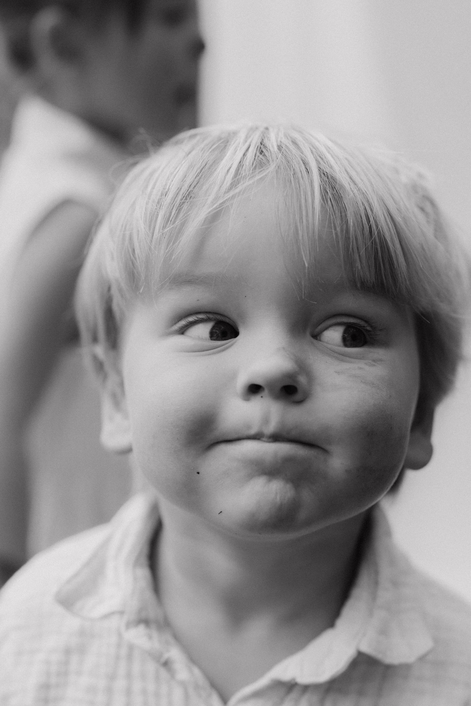 Series of expressive close-up portraits showing playful facial expressions.