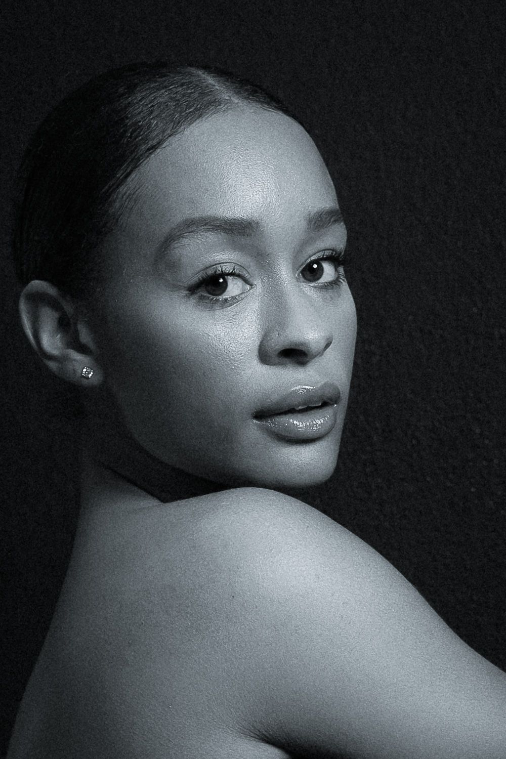 Dramatic black and white close-up portrait series showing artistic angles and expressions.