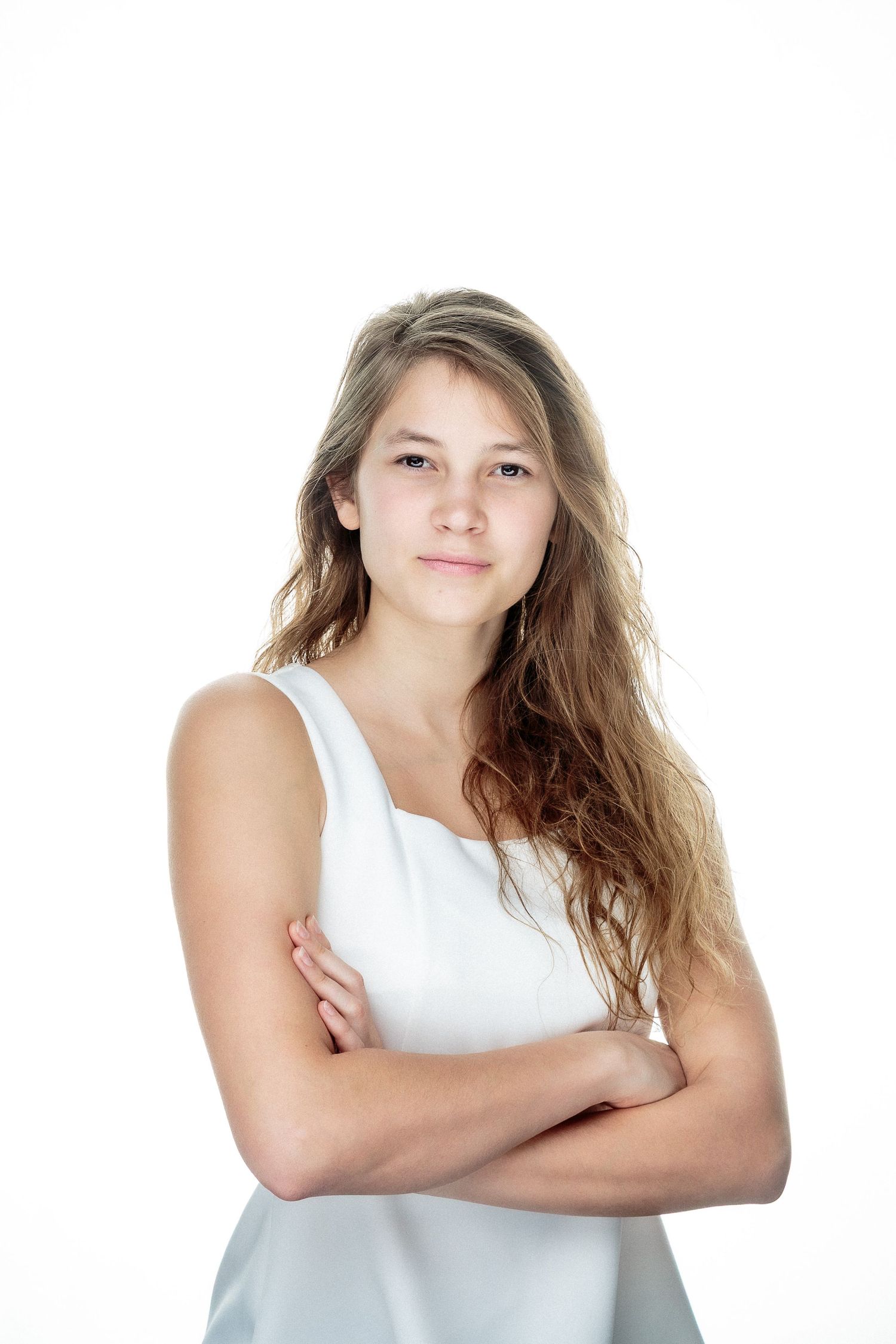 Portrait series of person in white tank top showing different poses against white background.