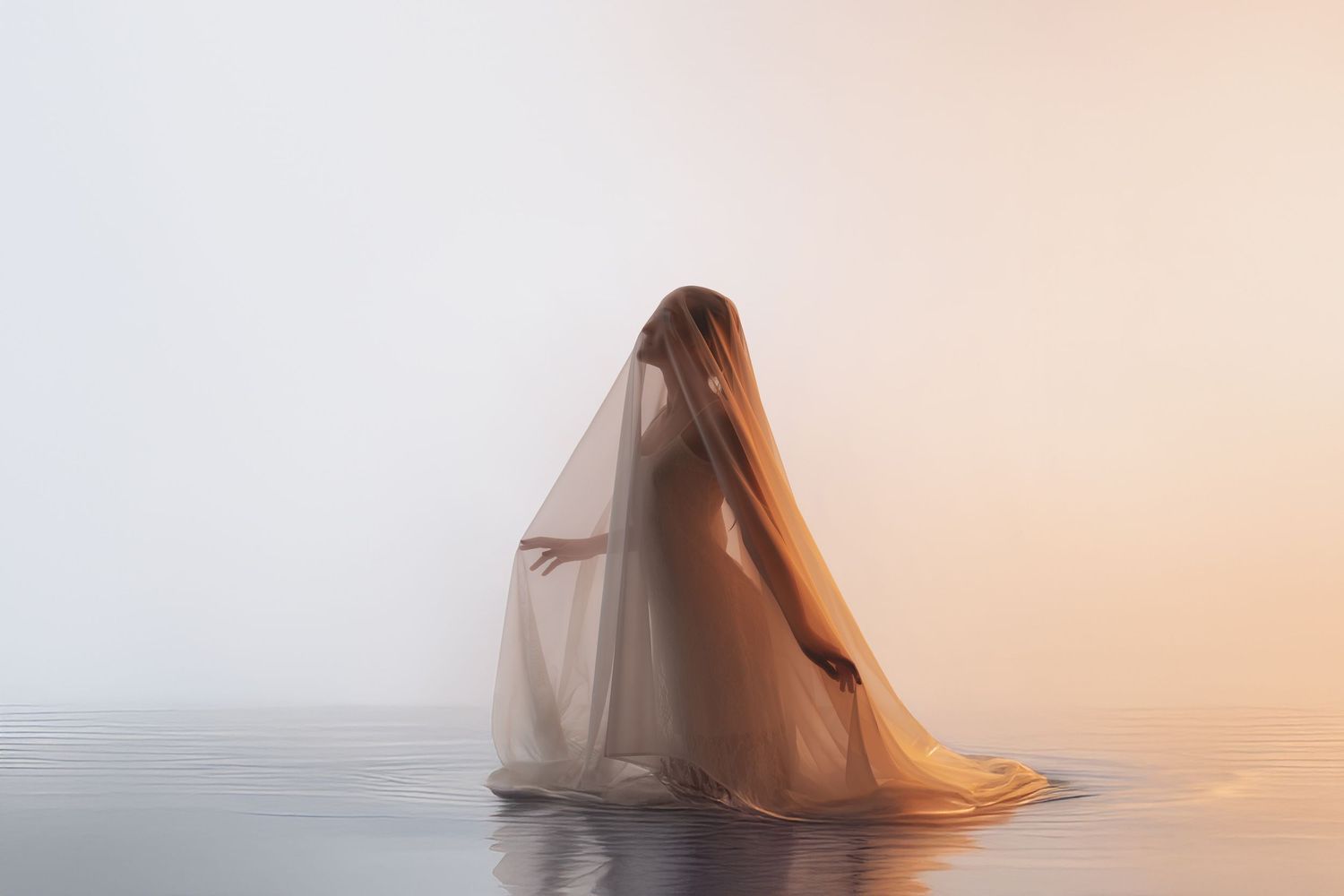 Ethereal figure draped in fabric creates dreamy silhouette against peachy background.