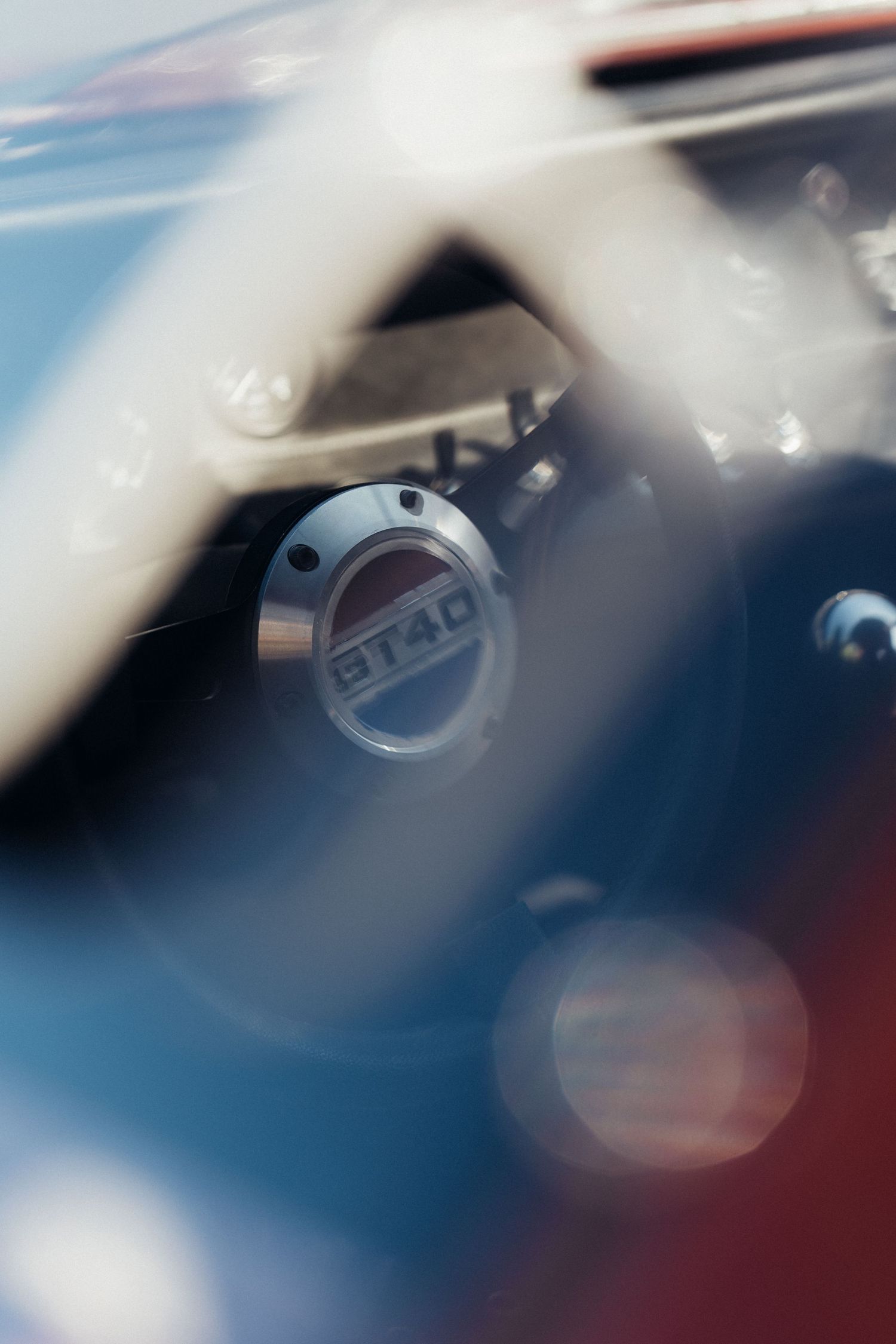 Macro shot of a GT40 badge with shallow depth of field.