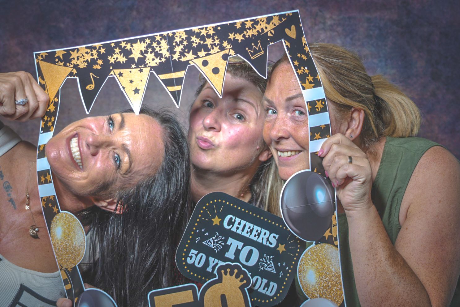 A collection of photo booth style party images showing people celebrating and posing together with festive decorations.