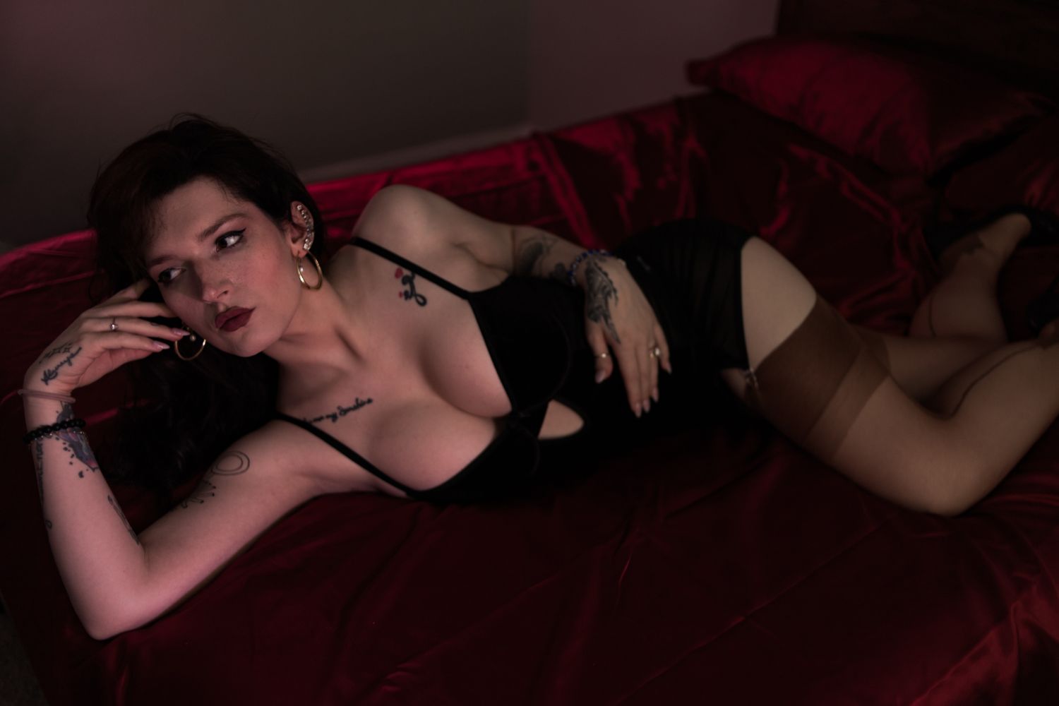 Dark photo strips showing intimate silhouettes and shadows in romantic setting.
