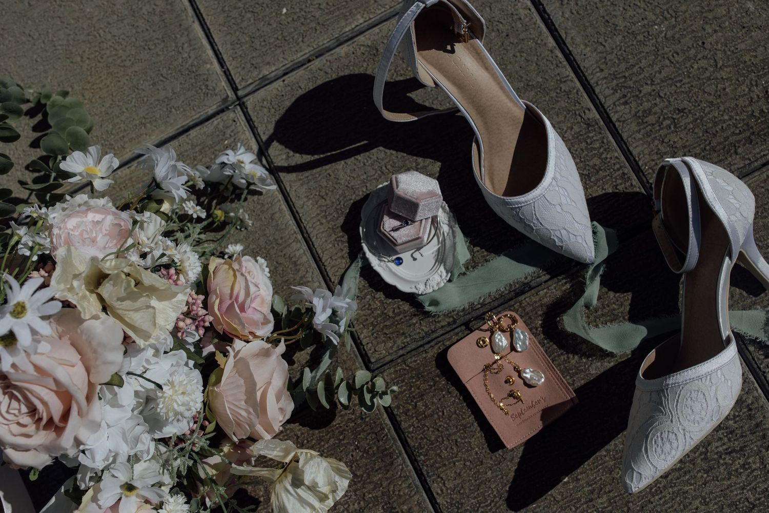 A collection of romantic wedding photos showing floral arrangements, bridal details, and intimate moments in muted tones.