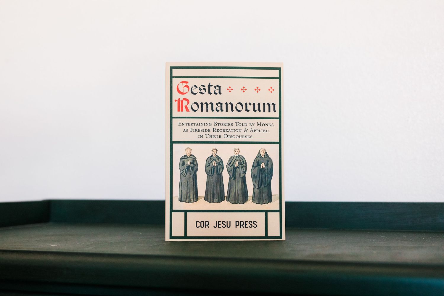 A collection of vintage book covers and spines displayed in a horizontal layout against a light background.
