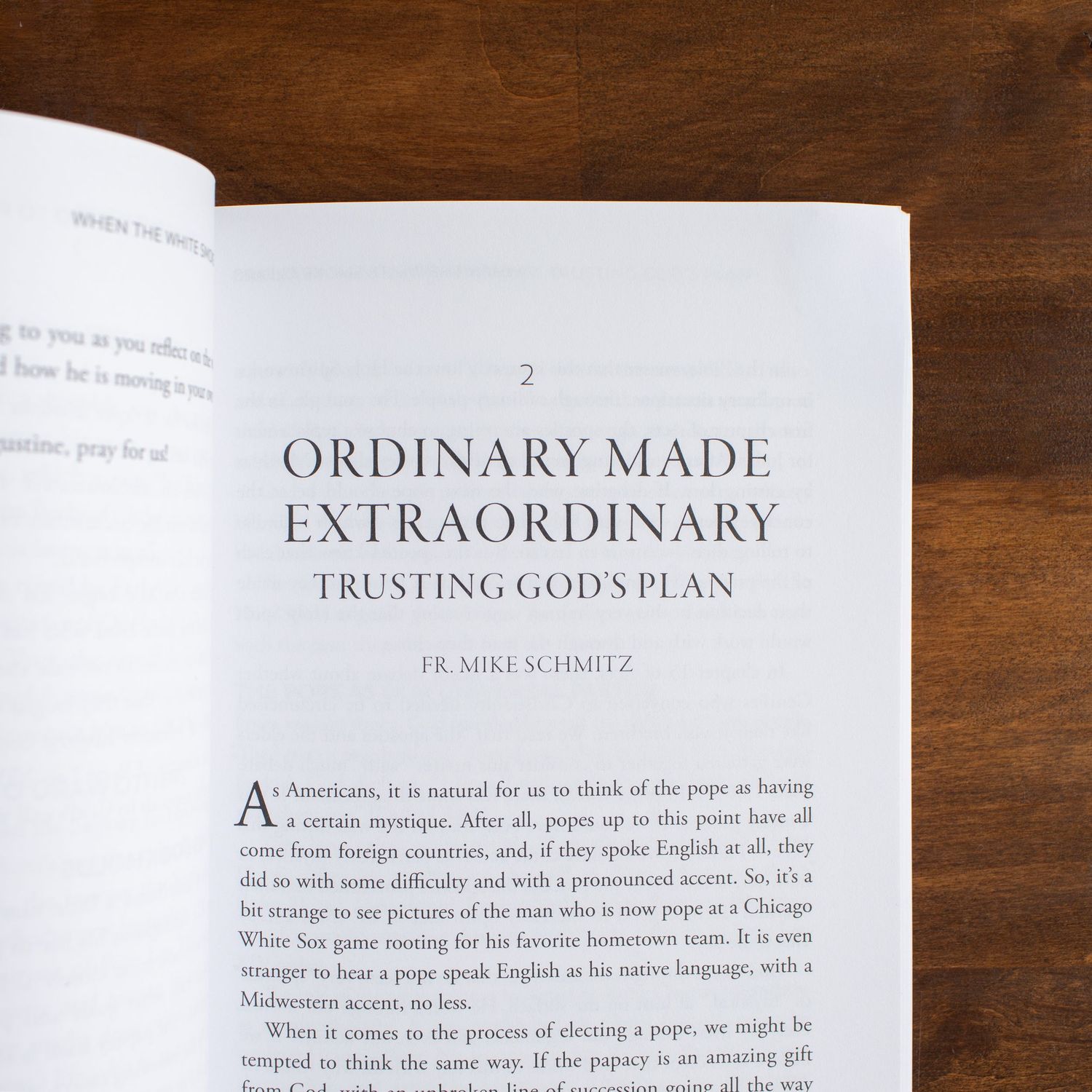 Book pages showing chapter titles 'Ordinary Made Extraordinary' and 'Trusting God's Plan' on white paper.