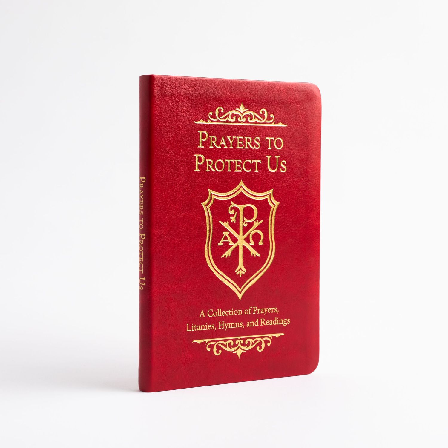Red leather prayer book with gold embossed religious symbol shown from three different angles on white background.