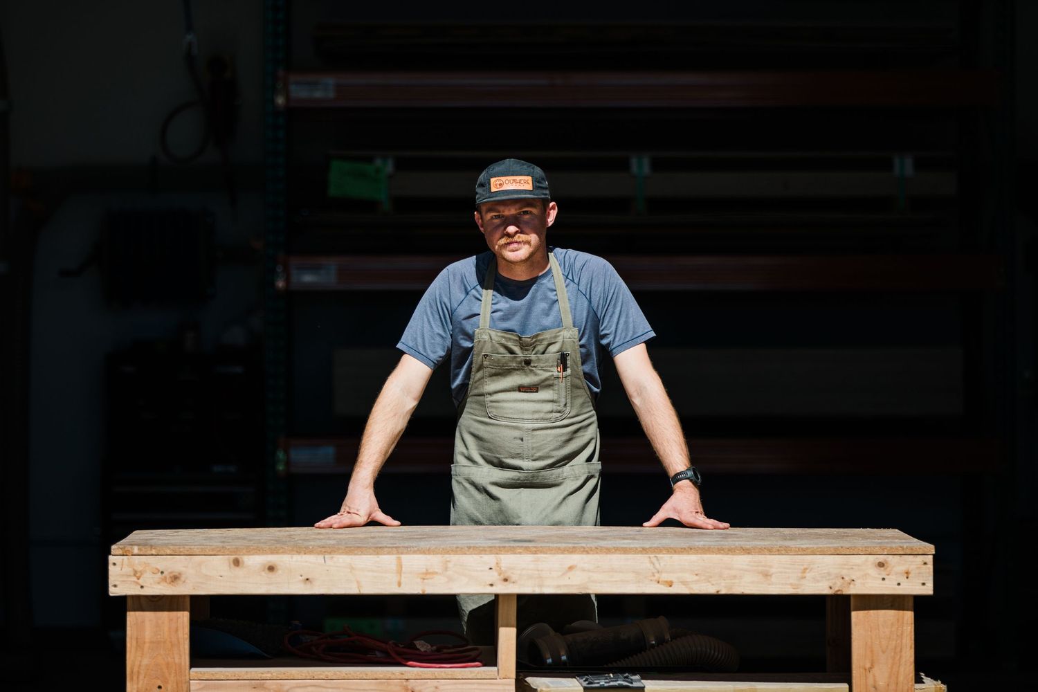 Wooden bench construction process shown in sequential progress shots.