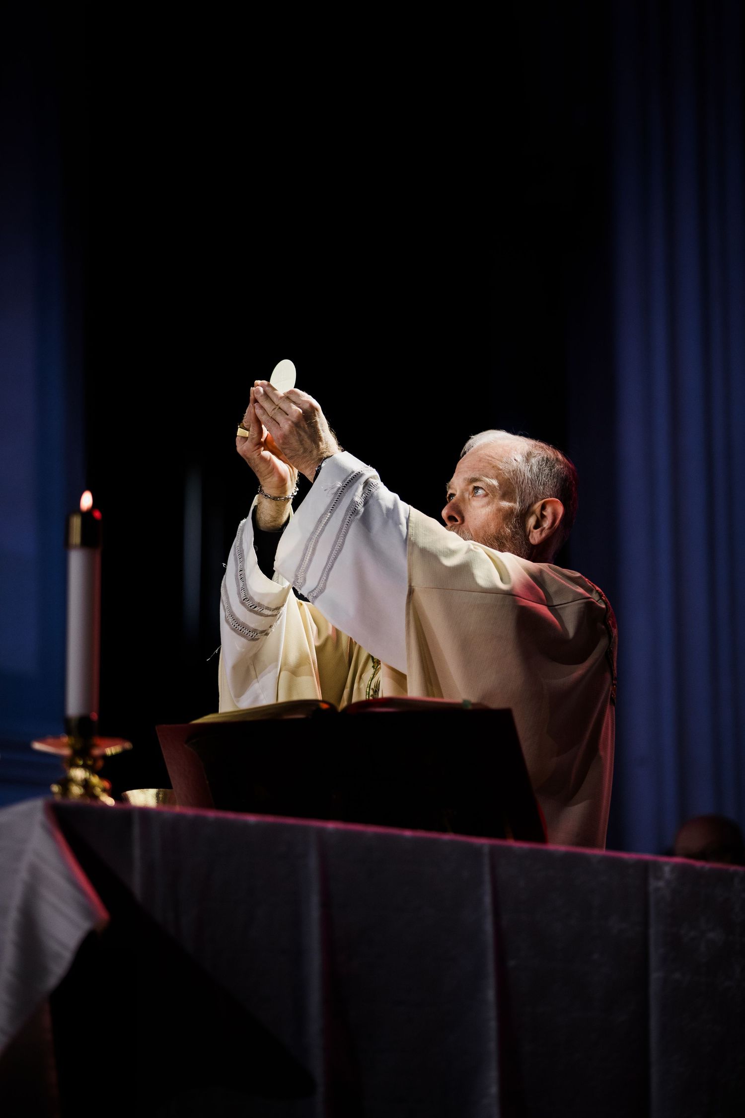 A series of photos showing a person in white robes performing ceremonial gestures at an altar.