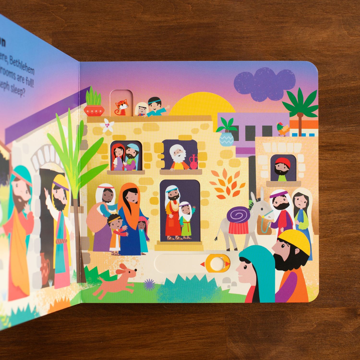 Panoramic biblical storybook illustration showing village scenes with figures and buildings in bright colors.
