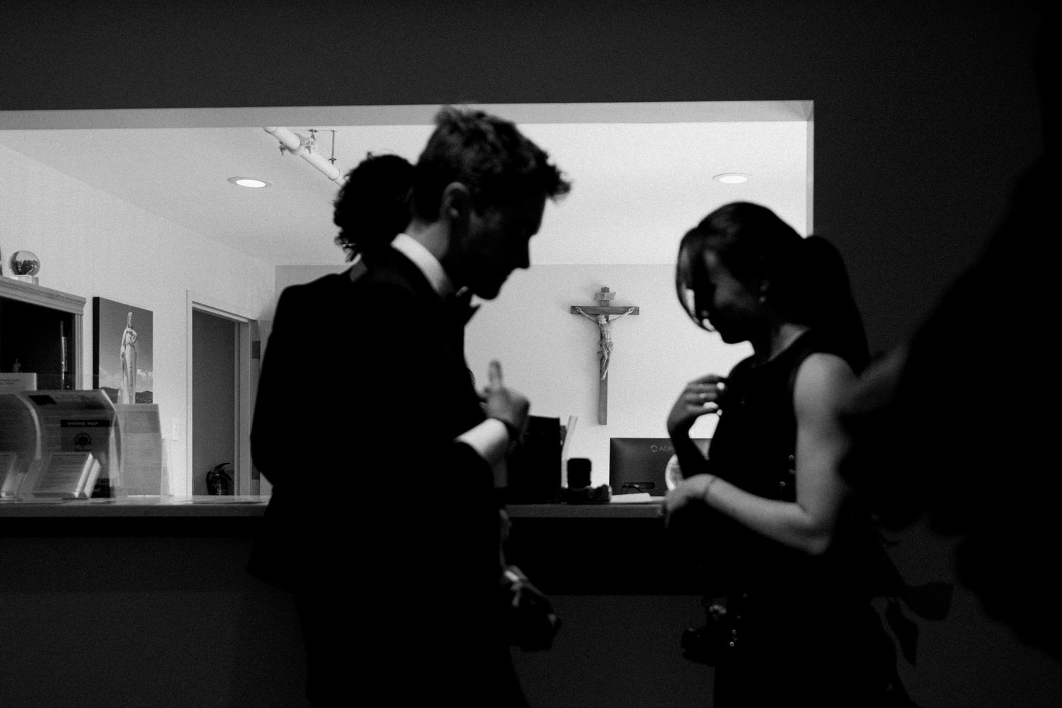 A series of black and white film stills showing silhouettes of people in dramatic lighting and composition.