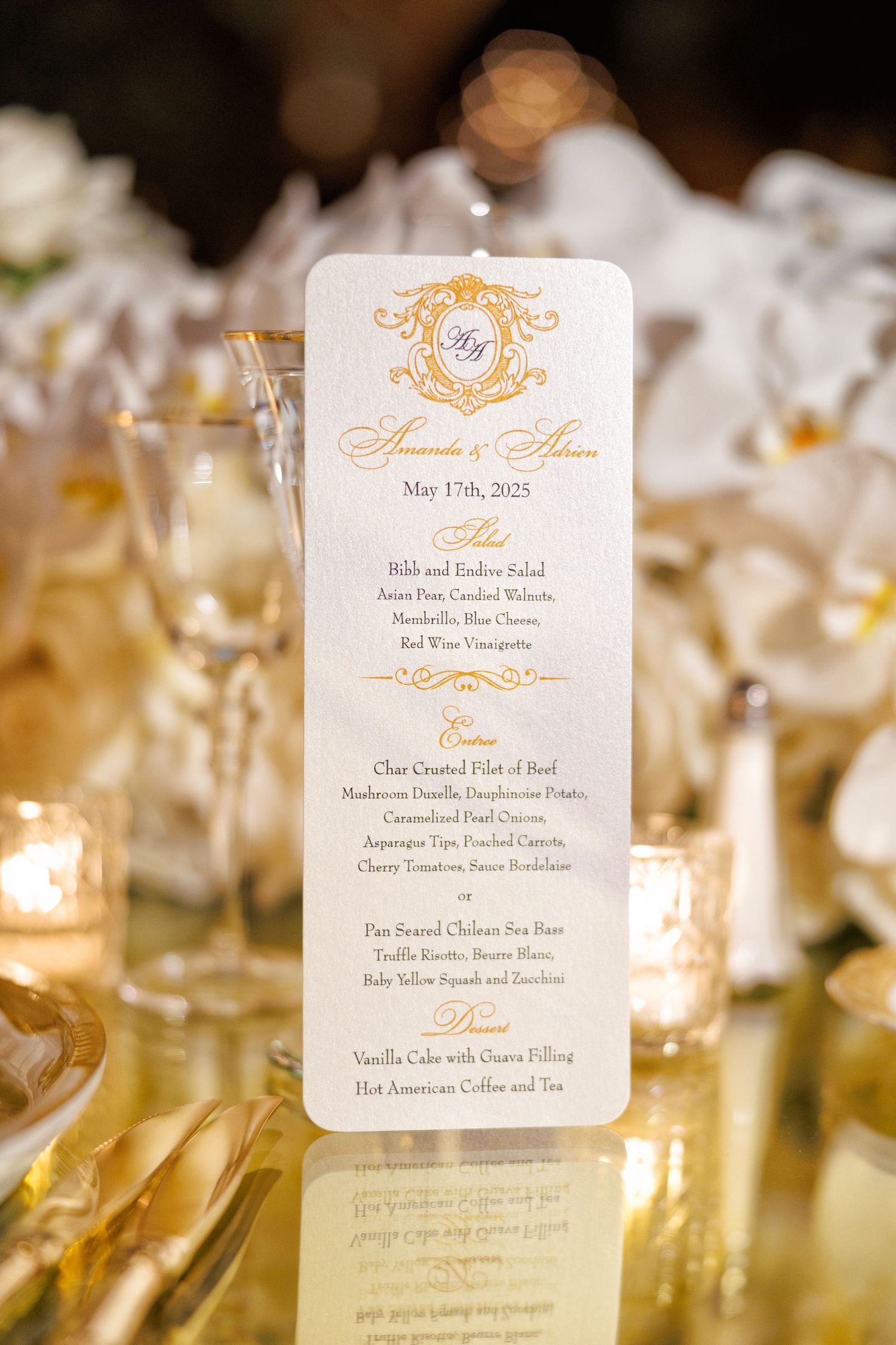 Elegant dinner menu design set on a table of gold accents and crystal.