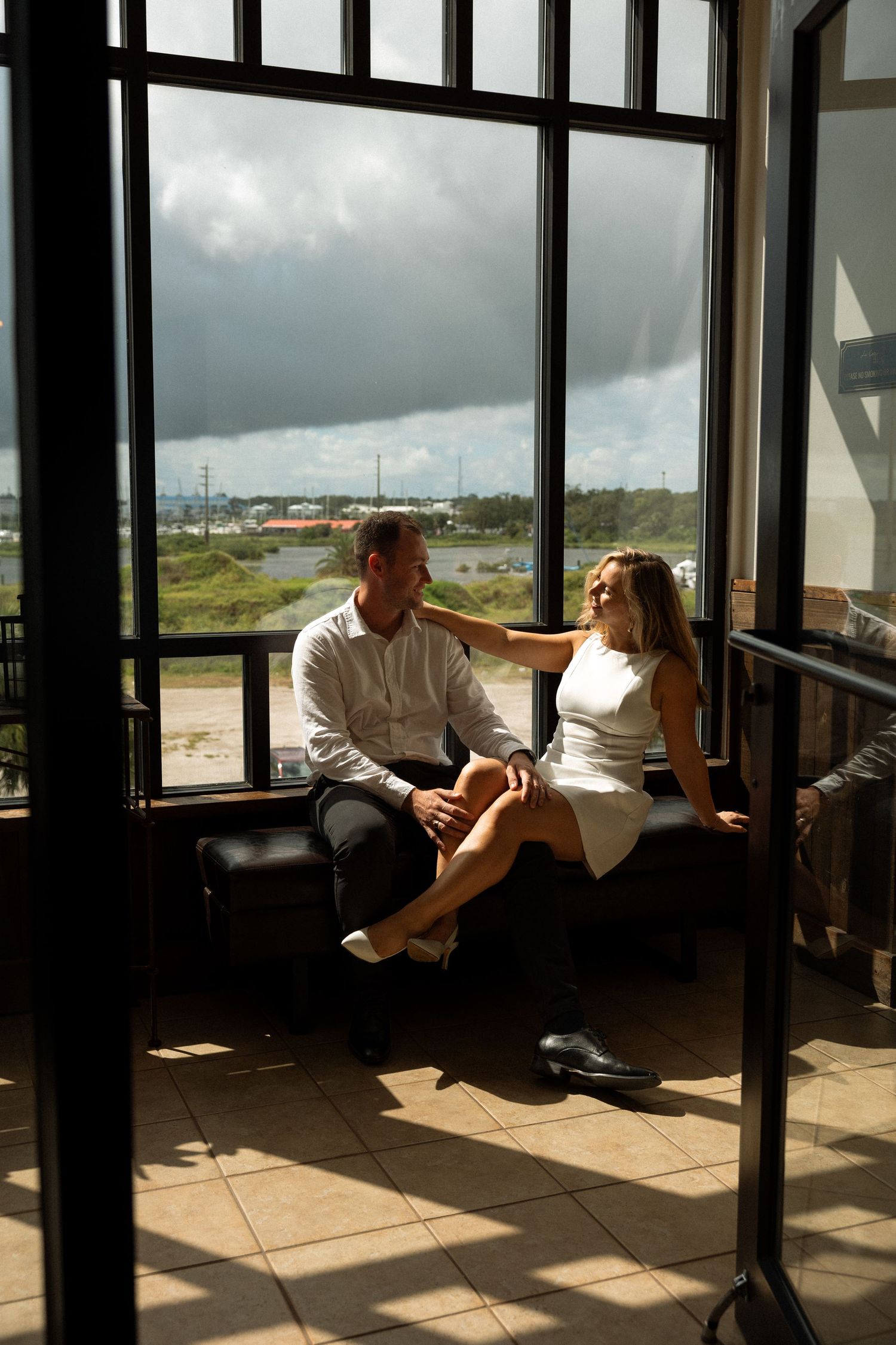 Couple exploring downtown St. Augustine during their engagement photoshoot