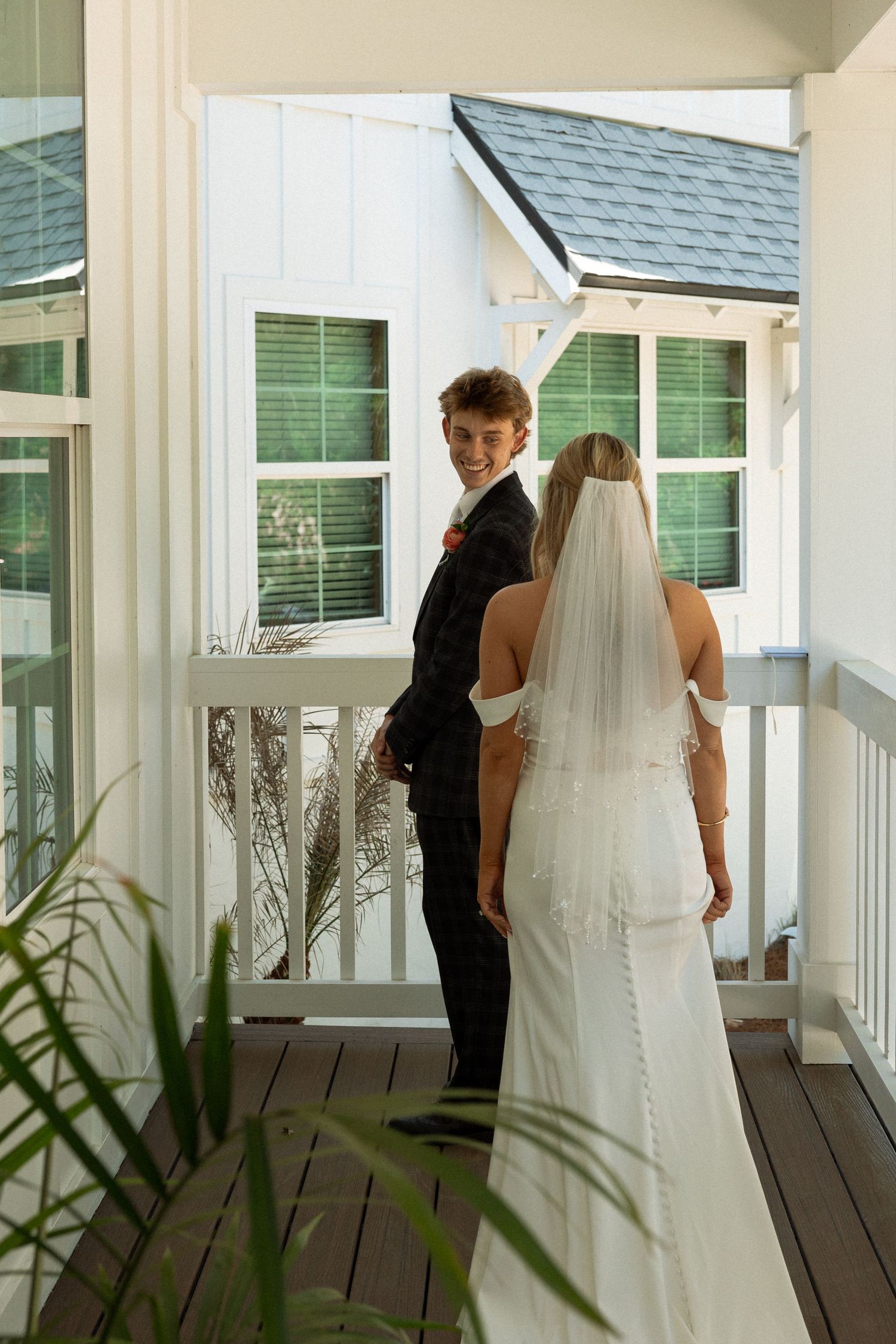Emotional first look between bride and groom before their wedding ceremony