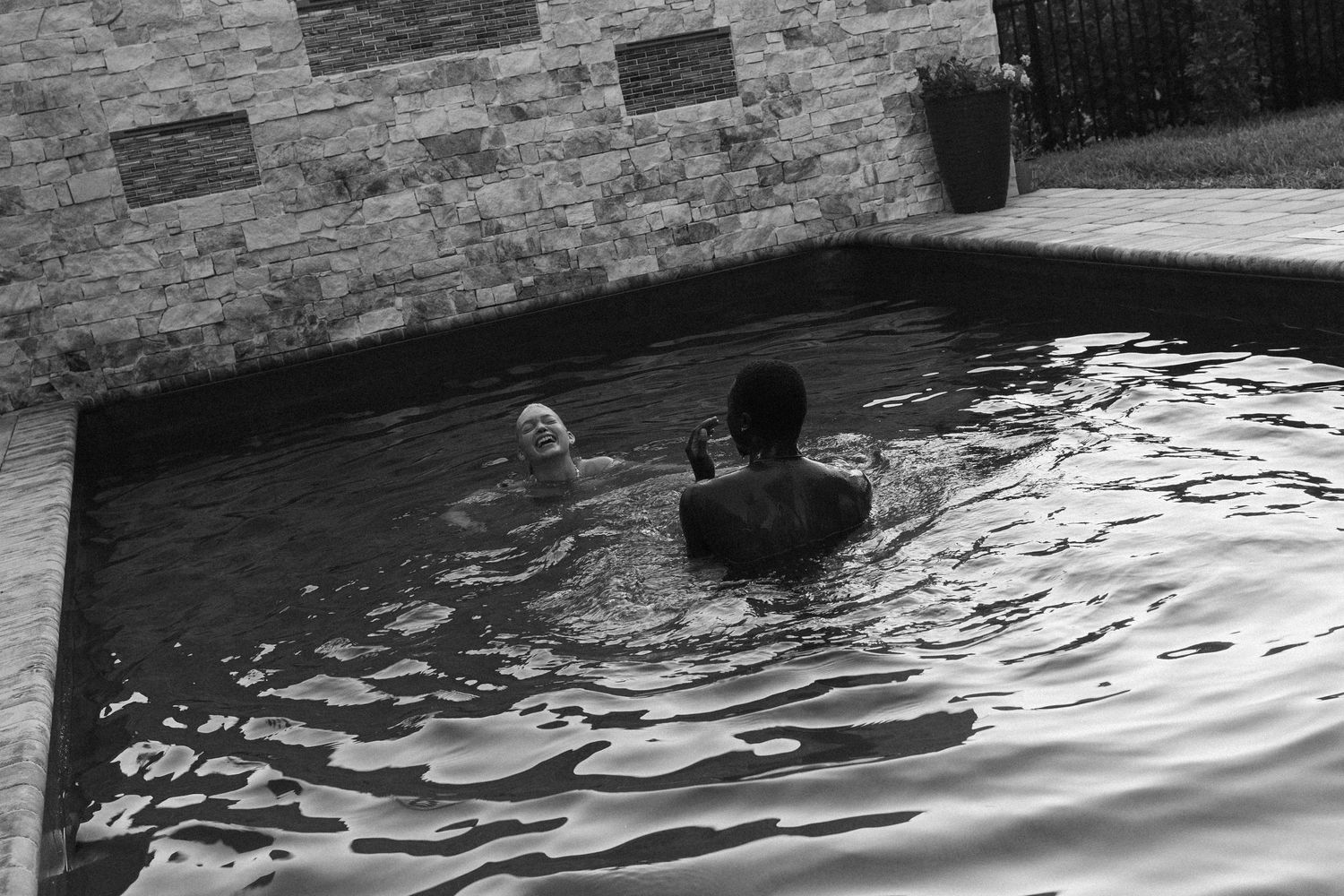 backyard pool couples photoshoot in North East Florida