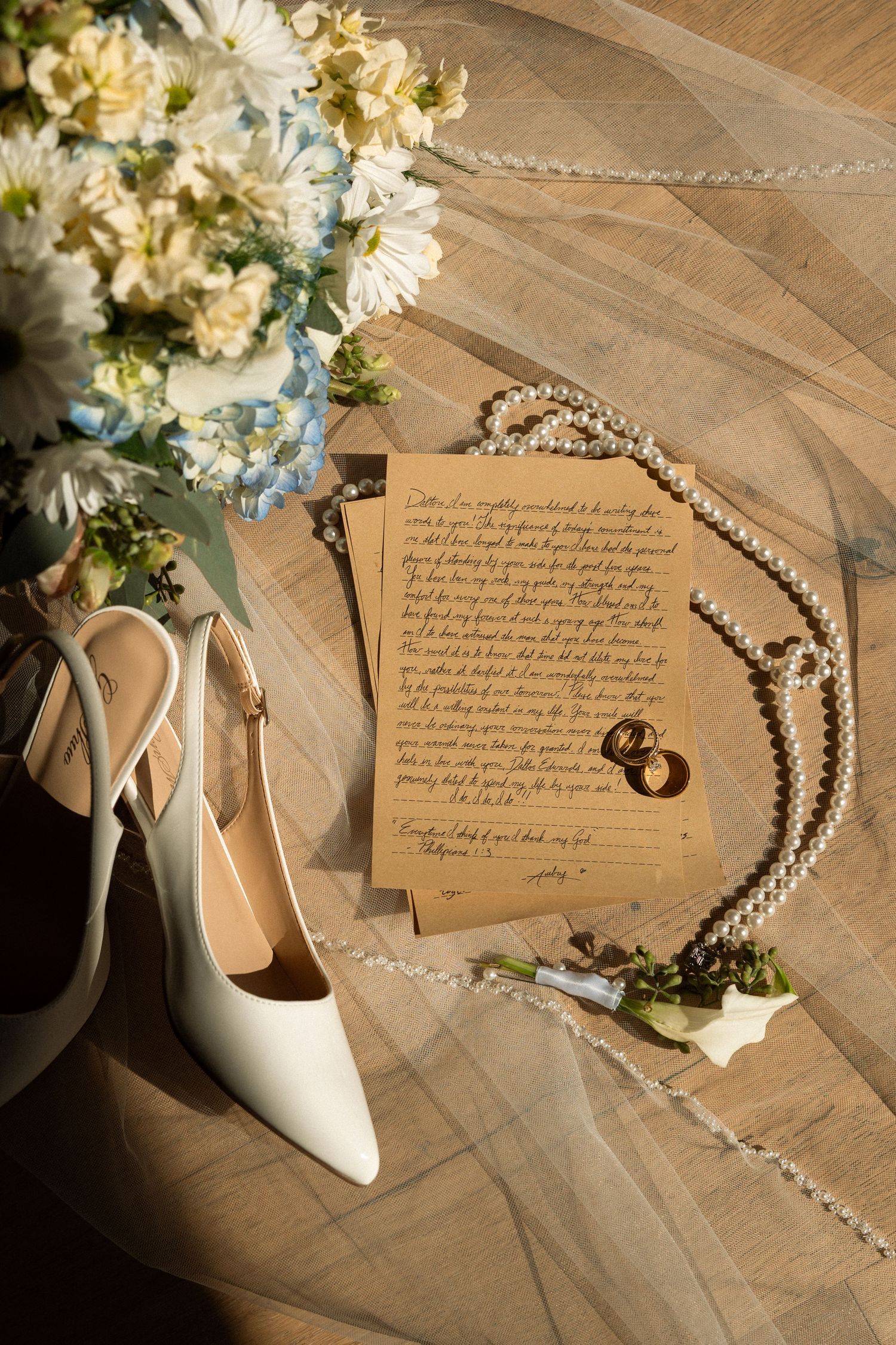 Wedding details including shoes, rings, and handwritten vows